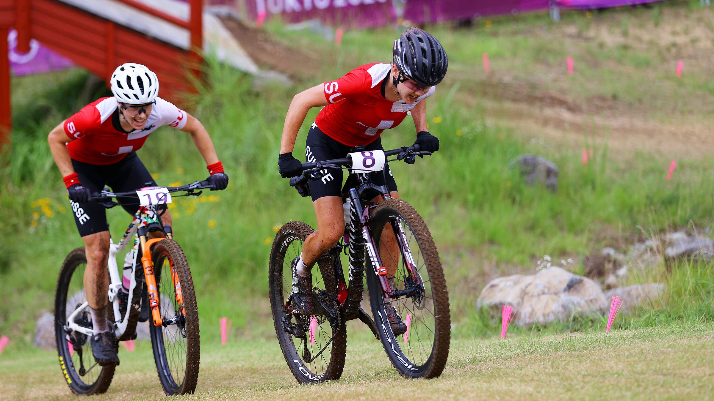 Sina Frei leads teammate Linda Indergand in the women's Olympic cross-country mountain bike race.