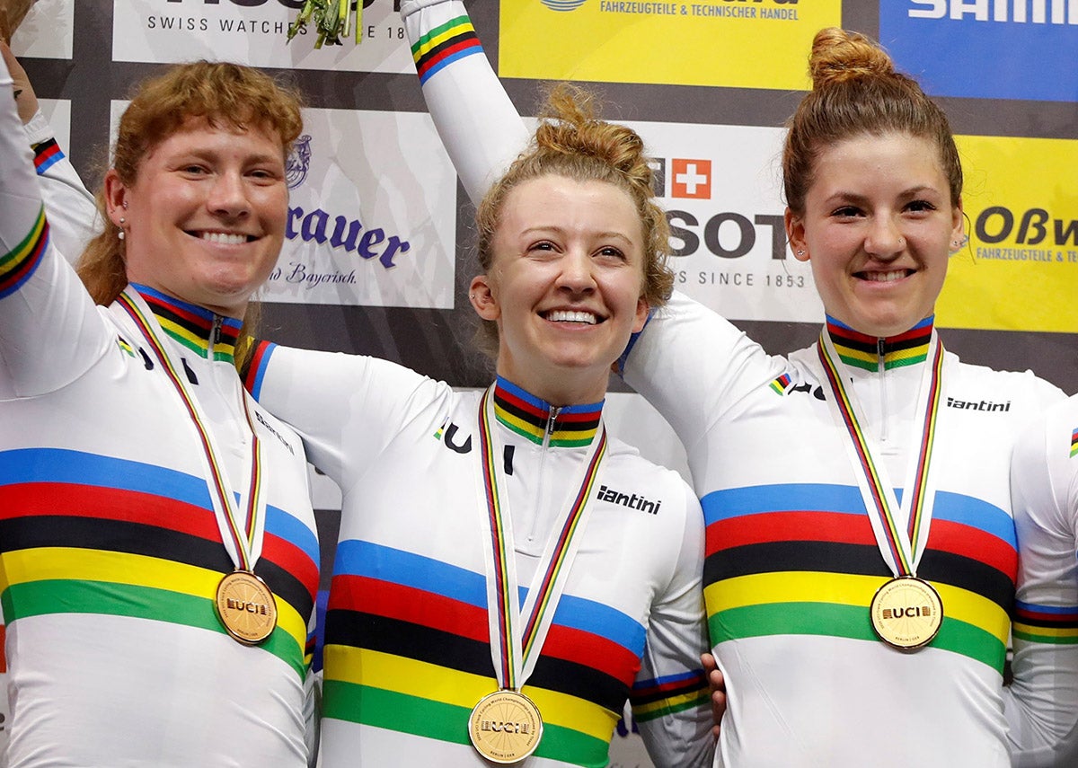 Winners US Jennifer Valente, Chloe Dygert, Emma White and Lily Williams pose on the podium after the Women's Team Pursuit Finals at the UCI track cycling World Championship at the velodrome in Berlin on February 27, 2020. (Photo by Odd ANDERSEN / AFP) (Photo by ODD ANDERSEN/AFP via Getty Images)