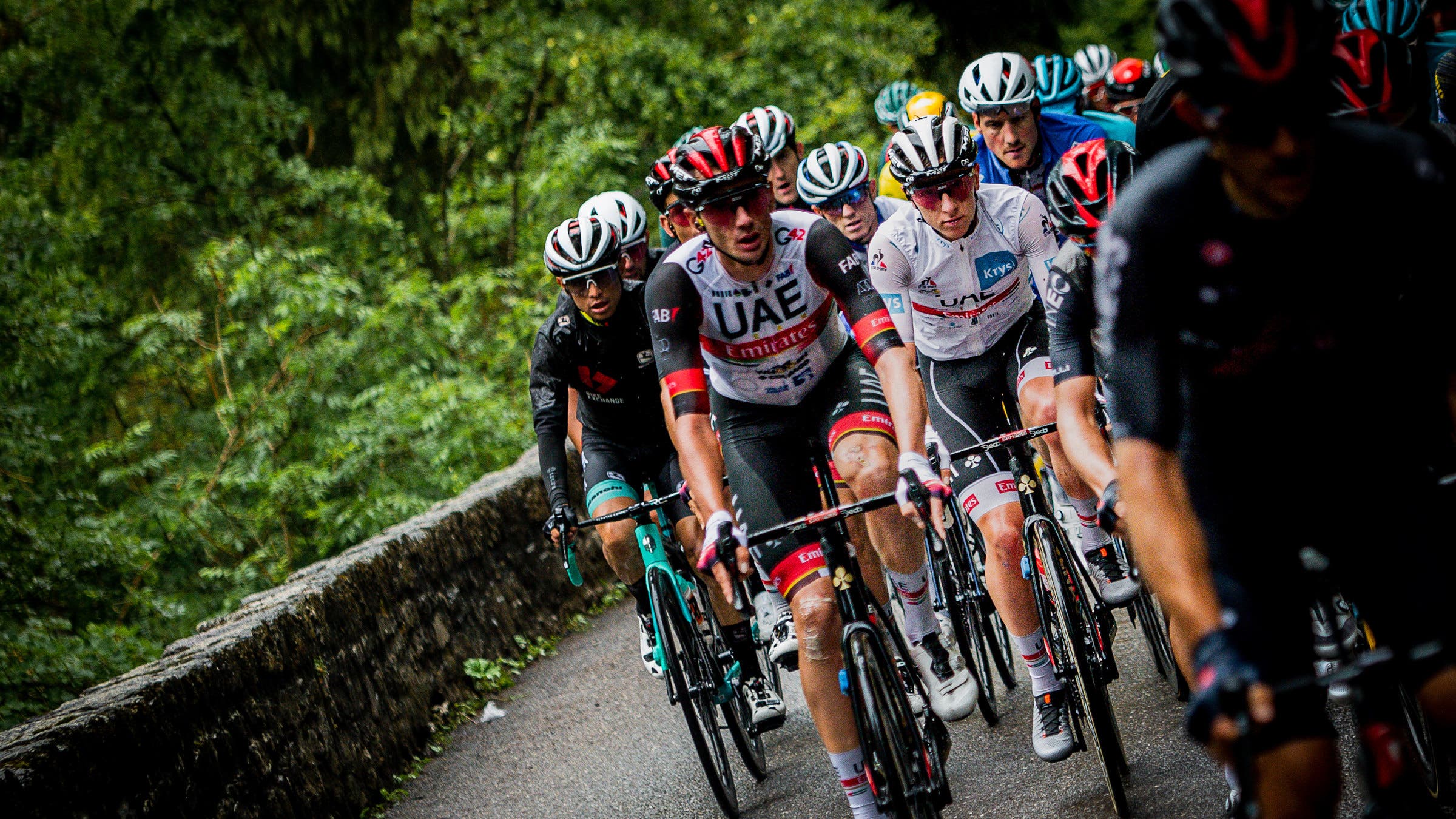 Tadej Pogacar protected by his team on stage 8 of the 2021 Tour de France. Photo: James Startt