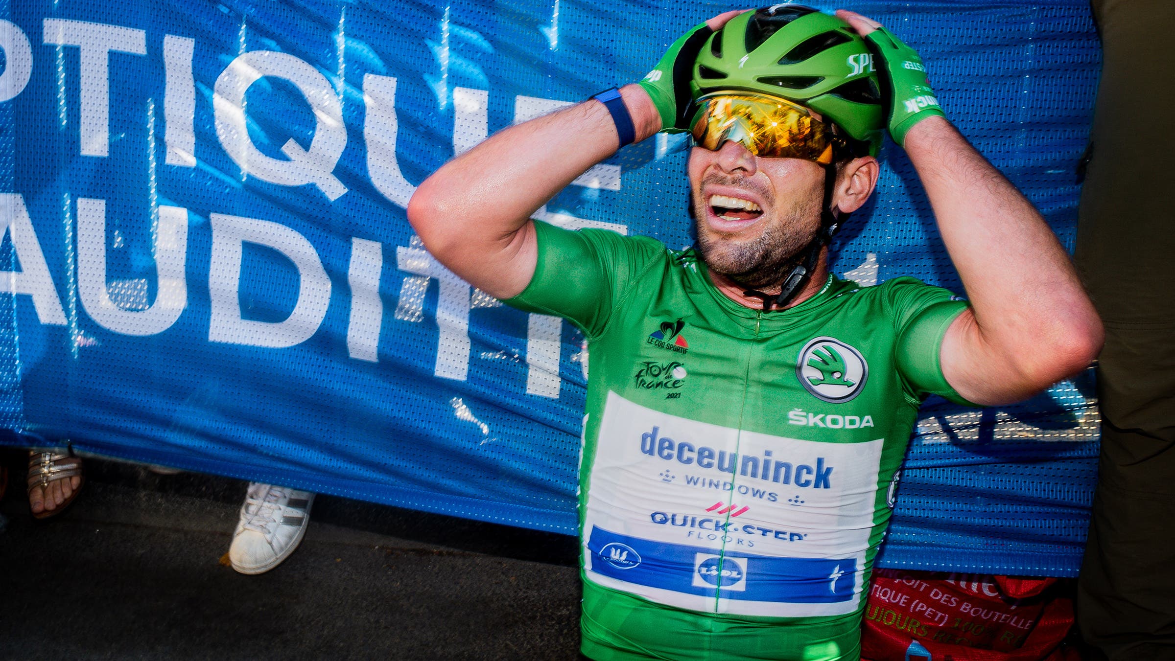 Mark Cavendish realizing he tied the record for Tour de France stage wins by an individual.