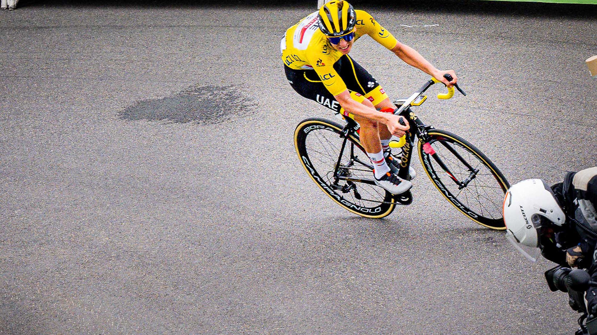 Tadej Pogacar riding to the win on stage 18 of the 2021 Tour de France.