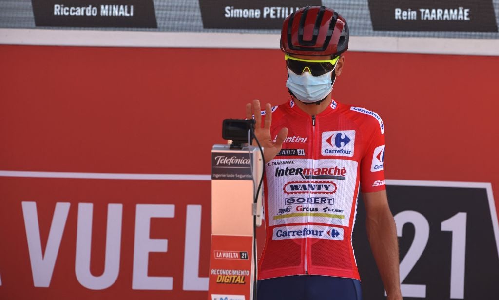 Team Wanty's Estonian rider Rein Taaramae checks his temperature before the start of the 5th stage of the 2021 La Vuelta cycling tour of Spain, a 184.4-km race from Tarancon to Albacete, on August 18, 2021. (Photo by JOSE JORDAN / AFP) (Photo by JOSE JORDAN/AFP via Getty Images)