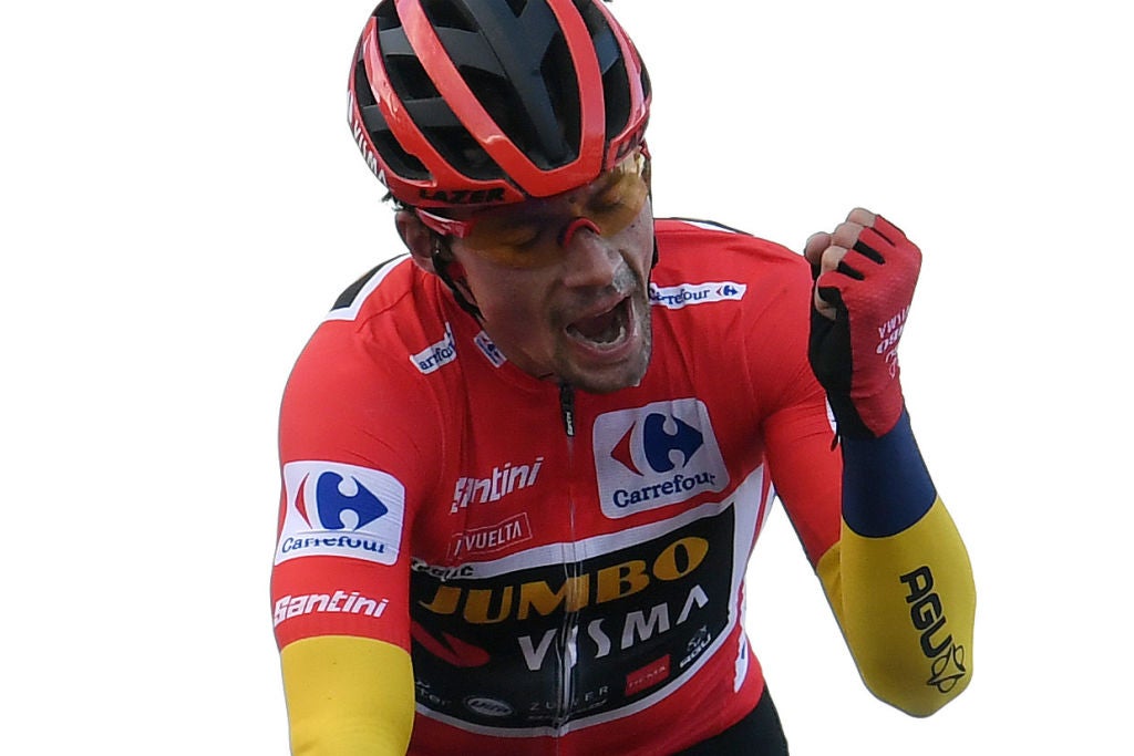 Primoz Roglic celebrates after holding off Richard Carapaz at the 2020 Vuelta a Espana