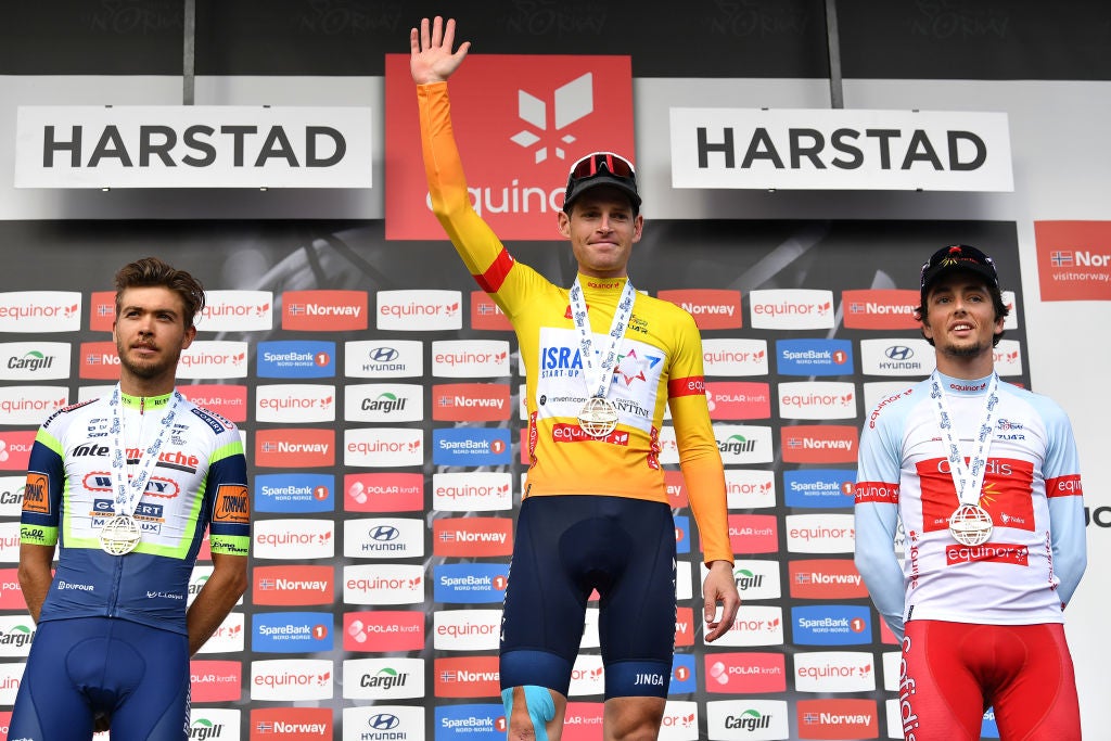 HARSTAD, NORWAY - AUGUST 08: (L-R) Odd Christian Eiking of Norway and Team Intermarché - Wanty - Gobert Matériaux, Ben Hermans of Belgium and Team Israel Start-Up Nation Yellow Leader Jersey &amp; Victor Lafay of France and Team Cofidis White Best Young Rider Jersey celebrate at final podium during the 8th Arctic Race Of Norway 2021, Stage 4 a 163,5km stage from Gratangen to Harstad 54m / #ArcticRace / on August 08, 2021 in Harstad, Norway. (Photo by Stuart Franklin/Getty Images)