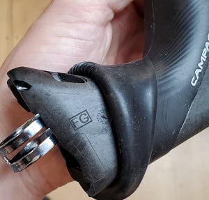 Campagnolo brake lever with model year designation.