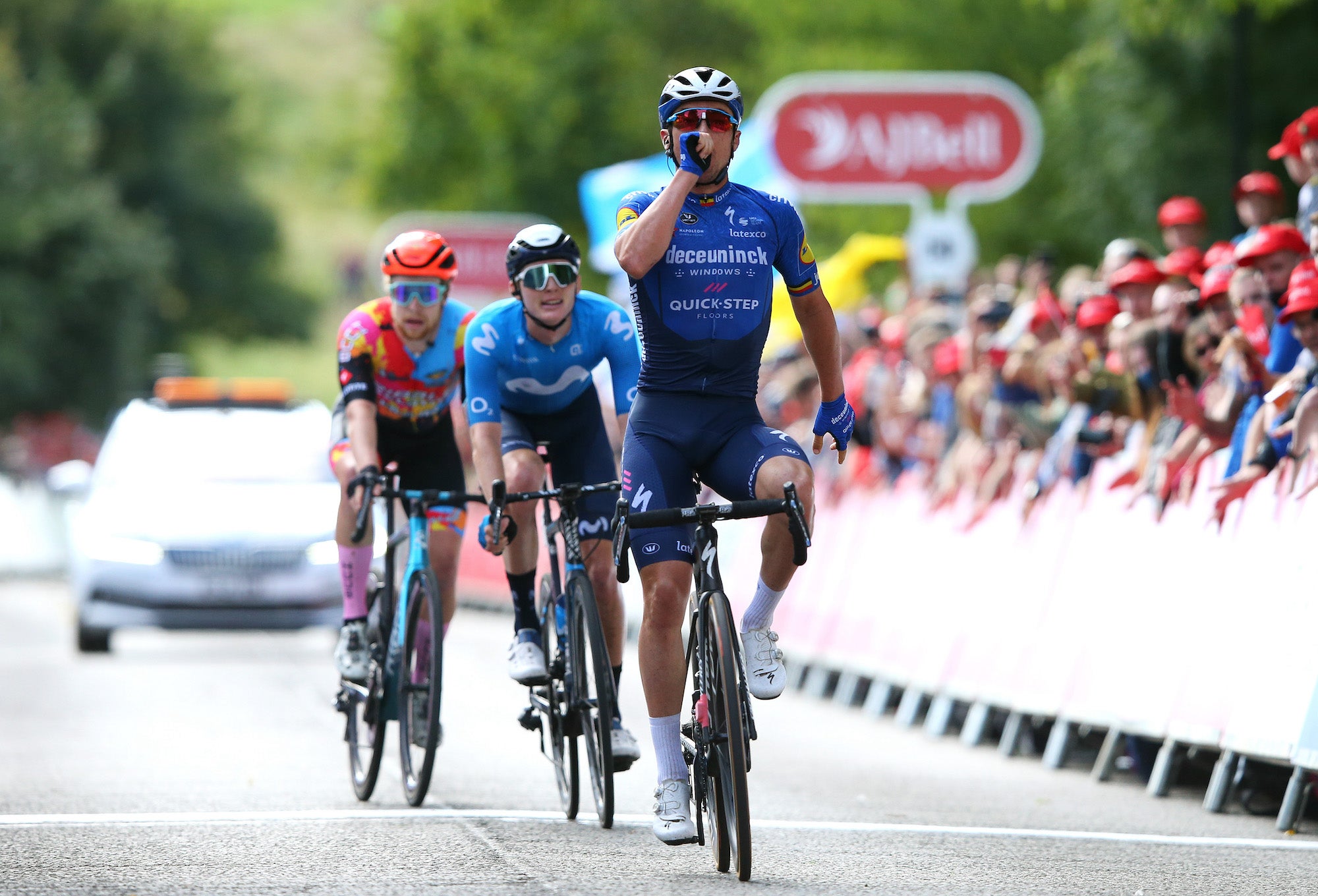EDINBURGH, SCOTLAND - SEPTEMBER 11: Yves Lampaert of Belgium and Team Deceuninck - Quick-Step celebrates at finish line as stage winner ahead of Matteo Jorgenson of United States and Movistar Team and Matthew Gibson of United Kingdom and Team Ribble Weldtite Pro Cycling during the 17th Tour of Britain 2021, Stage 7 a 194,8km stage from Hawick to Edinburgh / @TourofBritain / #TourofBritain / on September 11, 2021 in Edinburgh, Scotland. (Photo by Alex Livesey/Getty Images)