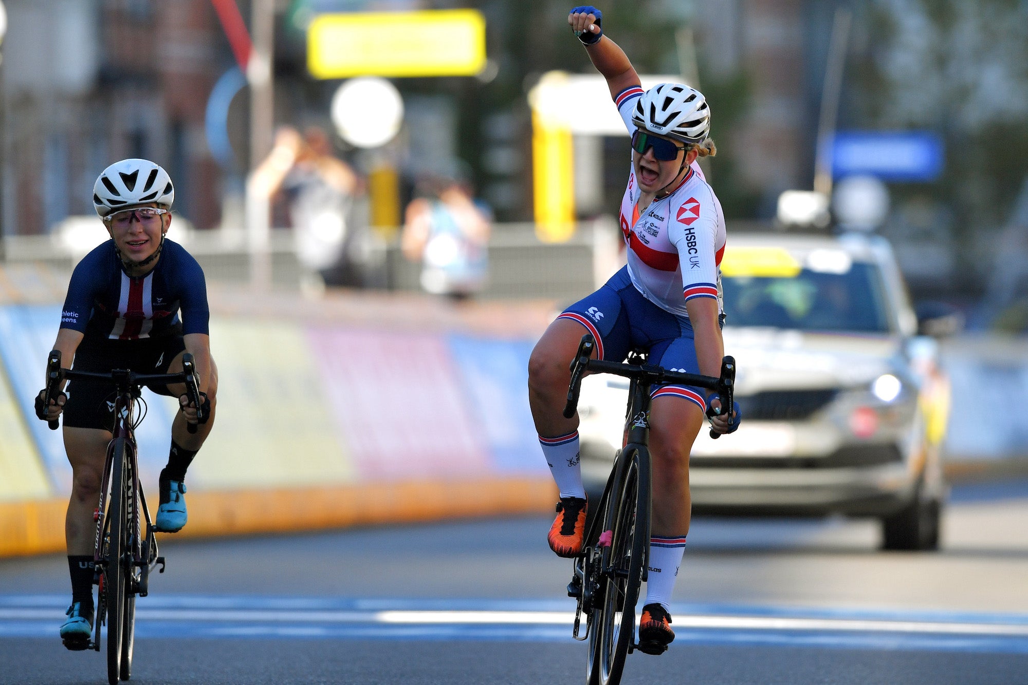 LEUVEN, BELGIUM - SEPTEMBER 25: Zoe Backstedt of The United Kingdom (R) celebrates at finish line as race winner ahead of Kaia Schmid of The United States (L) during the 94th UCI Road World Championships 2021 - Women Junior Road Race a 75,2km race from  Leuven to  Leuven / #flanders2021 / on September 25, 2021 in Leuven, Belgium. (Photo by Luc Claessen/Getty Images)