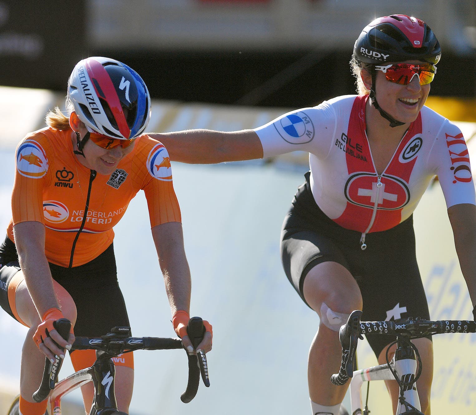 Anna van der Breggen crosses the line with Marlen Reusser in her final race