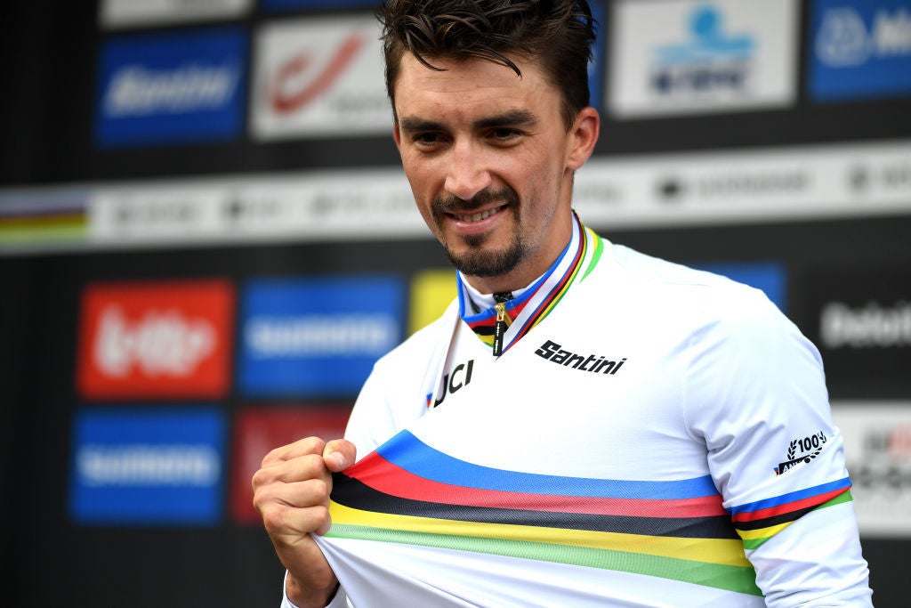 LEUVEN, BELGIUM - SEPTEMBER 26: Gold medalist Julian Alaphilippe of France celebrates winning during the medal ceremony after the 94th UCI Road World Championships 2021 - Men Elite Road Race a 268,3km race from Antwerp to Leuven / #flanders2021 / on September 26, 2021 in Leuven, Belgium. (Photo by Tim de Waele/Getty Images)