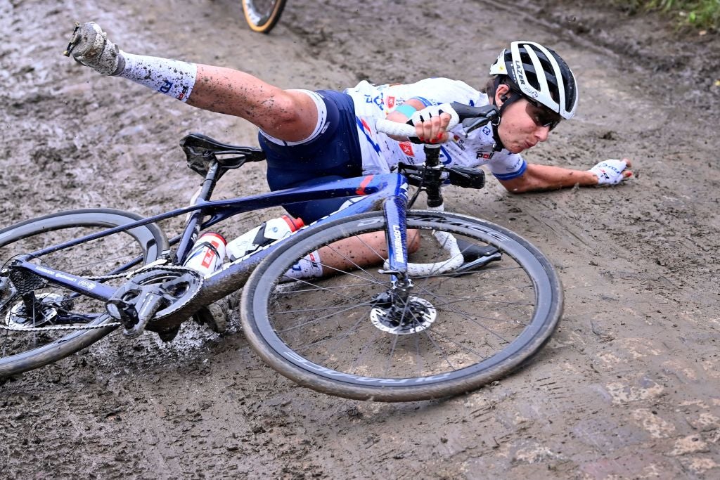 Eugenie Duval crashes on one of the Paris-Roubaix Femmes cobble sectors