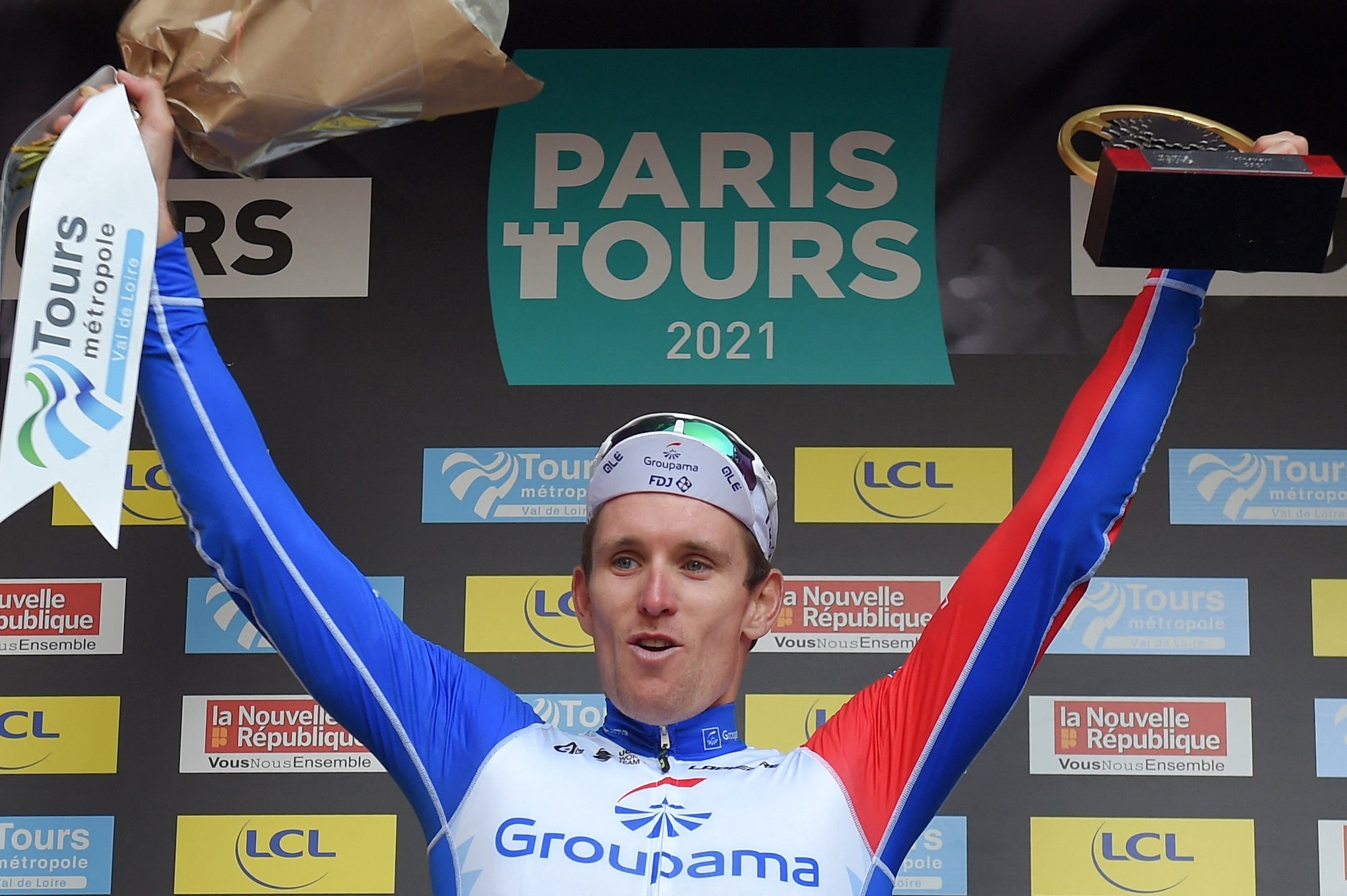 French rider of team Groupama FDJ Arnaud Demare celebrates on the podium after he won the 115th edition of the 212,3 km Paris-Tours one day cycling race, in Tours, Central France, on October 10, 2021. (Photo by GUILLAUME SOUVANT / AFP) (Photo by GUILLAUME SOUVANT/AFP via Getty Images)