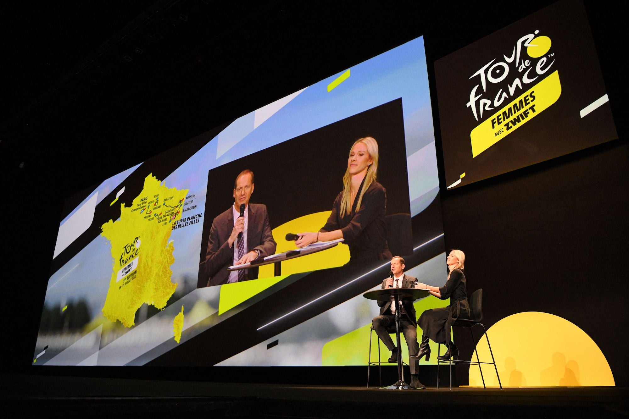 Tour de France director Christian Prudhomme delivers a speech next to French cyclist Marion Rousse during the official presentation of the first edition of the Tour de France Femmes cycling race, in Paris.