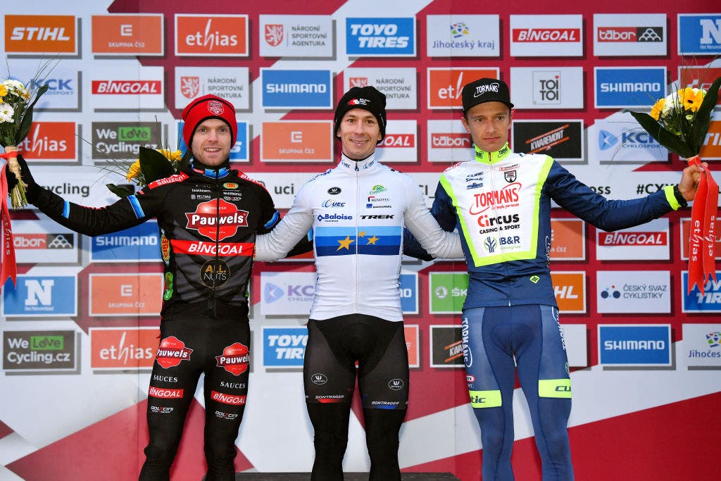 TABOR, CZECH REPUBLIC - NOVEMBER 14: (L-R) Eli Iserbyt of Belgium and Team Pauwels Sauzen - Bingoal on second place, race winner Lars Van Der Haar of Netherlands and Team Baloise Trek Lions and Quinten Hermans of Belgium and Tormans-Circus Cyclo Cross Team on third place, pose on the podium during the podium ceremony after the 25th Tabor UCI Cyclo-Cross Worldcup 2021 - Men's Elite / #CXWorldCup / on November 14, 2021 in Tabor, Czech Republic. (Photo by )