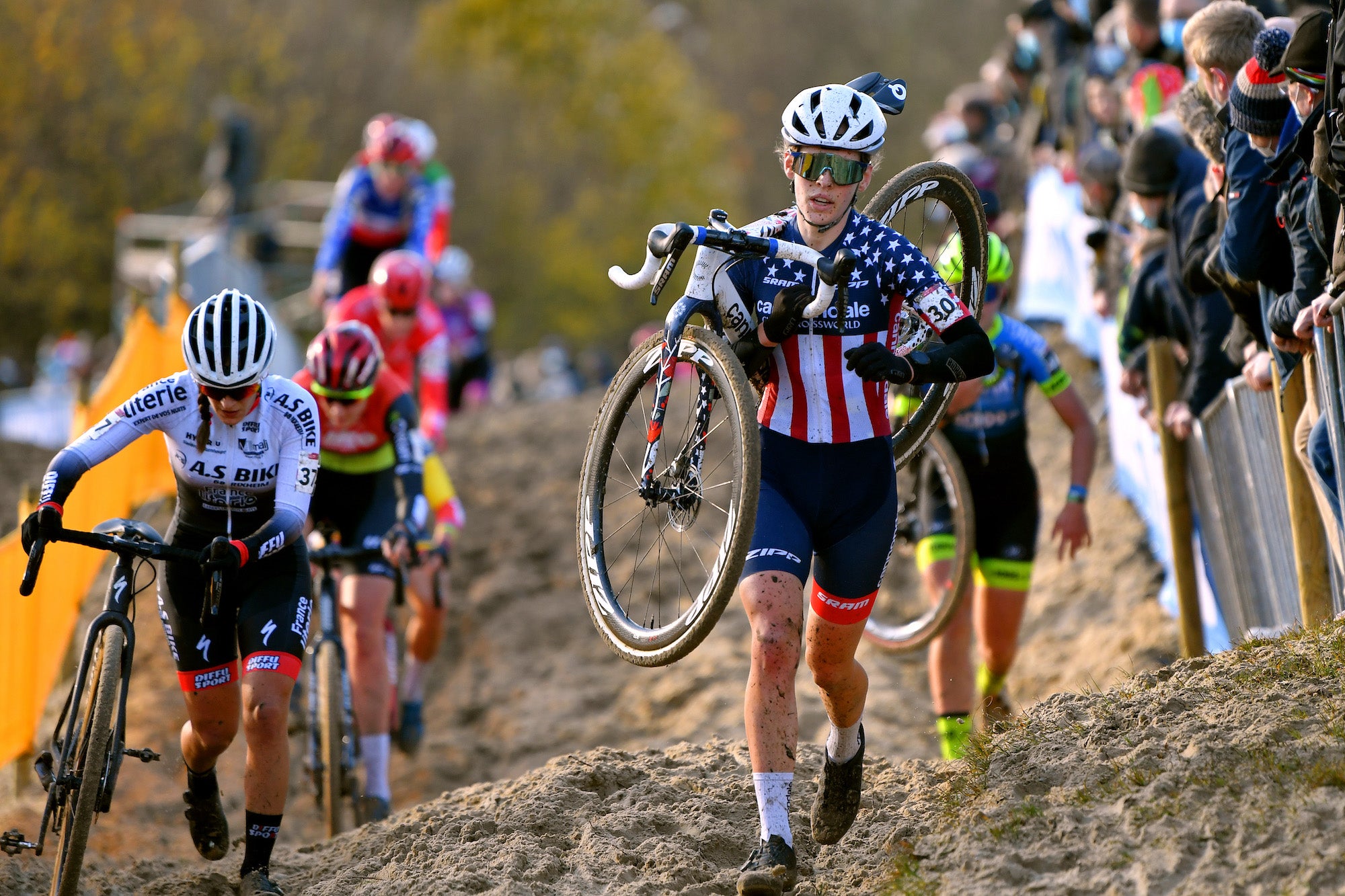 KOKSIJDE, BELGIUM - NOVEMBER 21: (L-R) Perrine Clauzel of France and A.S Bike Crossteam and Clara Honsinger of United States and Team Cannondale/Cyclocrossworld compete during the 50th Koksijde UCI Cyclo-Cross Worldcup 2021, Women's Elite / #CXWorldCup / on November 21, 2021 in Koksijde, Belgium. (Photo by Luc Claessen/Getty Images)