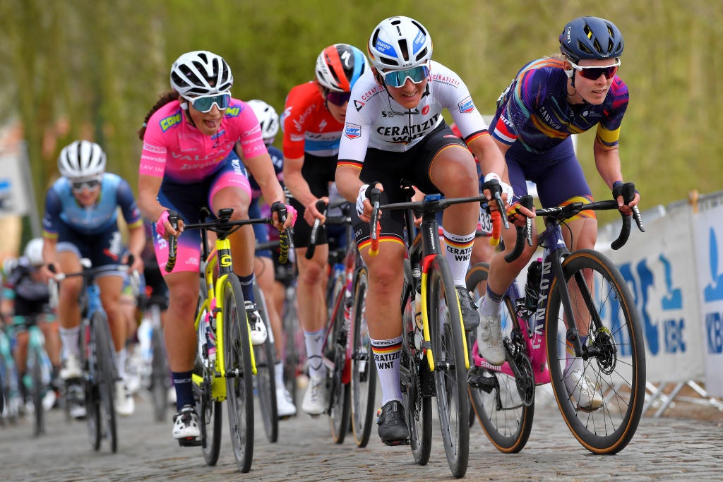 WEVELGEM, BELGIUM - MARCH 28: Elisa Balsamo of Italy and Team Valcar - Travel & Service, Lisa Brennauer of Germany and Ceratizit – WNT Pro Cycling Team & Hannah Barnes of United Kingdom and Team Canyon SRAM Racing during the 10th Gent-Wevelgem In Flanders Fields 2021, Women's Elite a 141,7km race from Ypres to Wevelgem / Kemmelberg (Ossuaire) Cobblestones / #GWE21 / #GWEWomen / @FlandersClassic / #UCIWWT / on March 28, 2021 in Wevelgem, Belgium. (Photo by Luc Claessen/Getty Images)