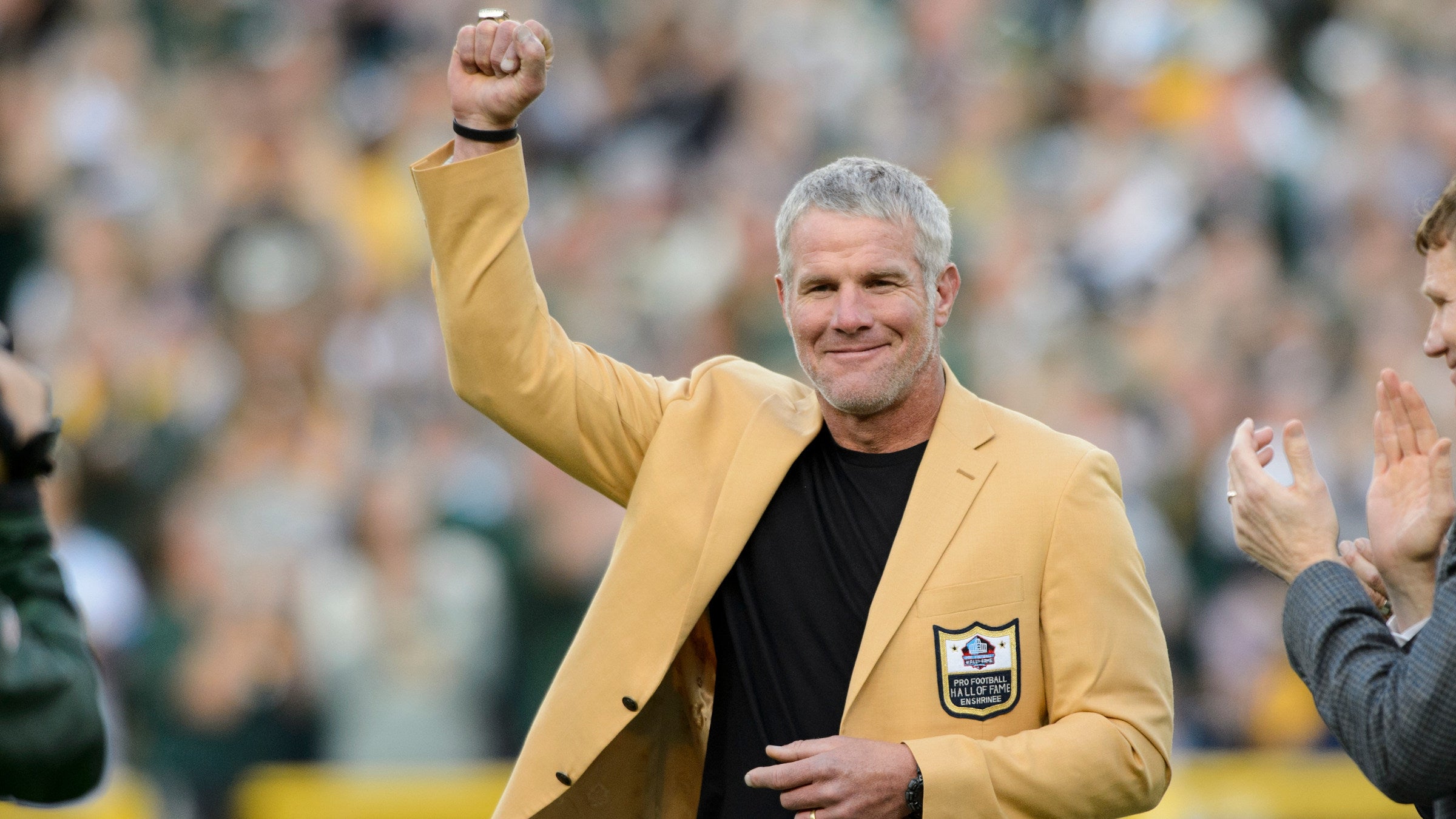 GREEN BAY, WI - OCTOBER 16: Former NFL quarterback Brett Farve looks on as he is inducted into the Ring of Honor during a halftime ceremony during the game between the Green Bay Packers and the Dallas Cowboys on October 16, 2016 at Lambeau Field in Green Bay, Wisconsin. The Cowboys defeated the Packers 30-16. 