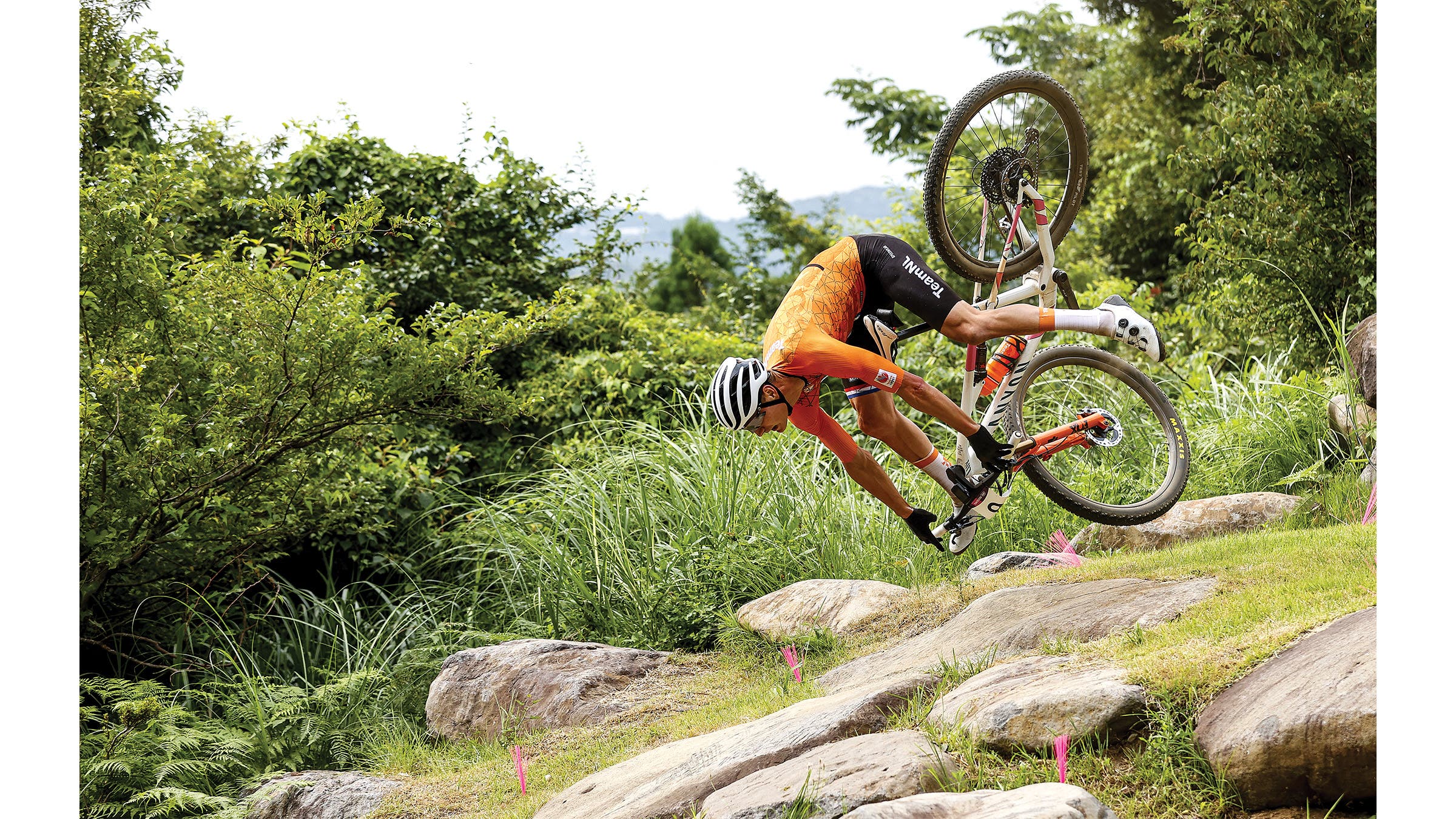 Van der Poel mid-air over boulders