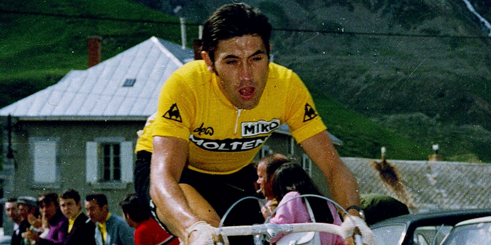 Belgian cyclist Eddy Merckx (yellow jersey) answers journalist' questions after winning the Tour de France for the fifth time at the Velodrome de Vincennes in Paris after the 22th and last stage of the 61th edition of the Tour de France cycling race between Orleans and Paris La Cipale on July 21, 1974. During his career Merckx won 524 races, captured 3 World Road champion titles (1967, 71, 74), won five times the Tour de France (1969, 70, 71, 72, 74) and the Tour d'Italie (1968, 70, 72, 73, 74). (Photo by AFP) (Photo by -/AFP via Getty Images)