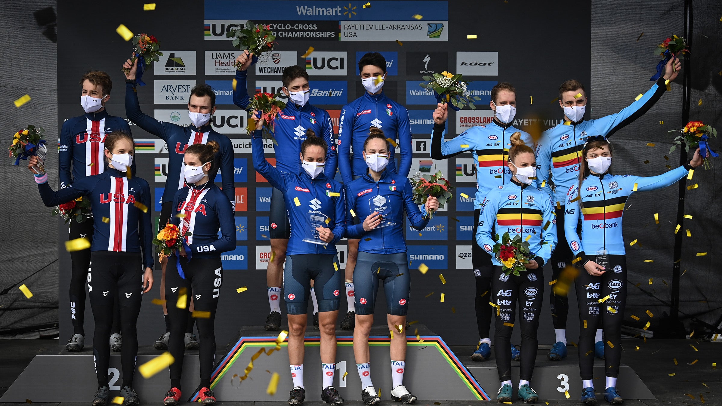 Us team , winner of the silver medal, Italian Team , winner of the gold medal and Belgian Team , winner of the bronze medal pictured on the podium of the mixed Team Relay race at the World Championship cyclocross cycling in Fayetteville, United States, Friday 28 January 2022. The world championships are taking place from 28 to 30 January. BELGA PHOTO DAVID STOCKMAN (Photo by DAVID STOCKMAN/BELGA MAG/AFP via Getty Images)