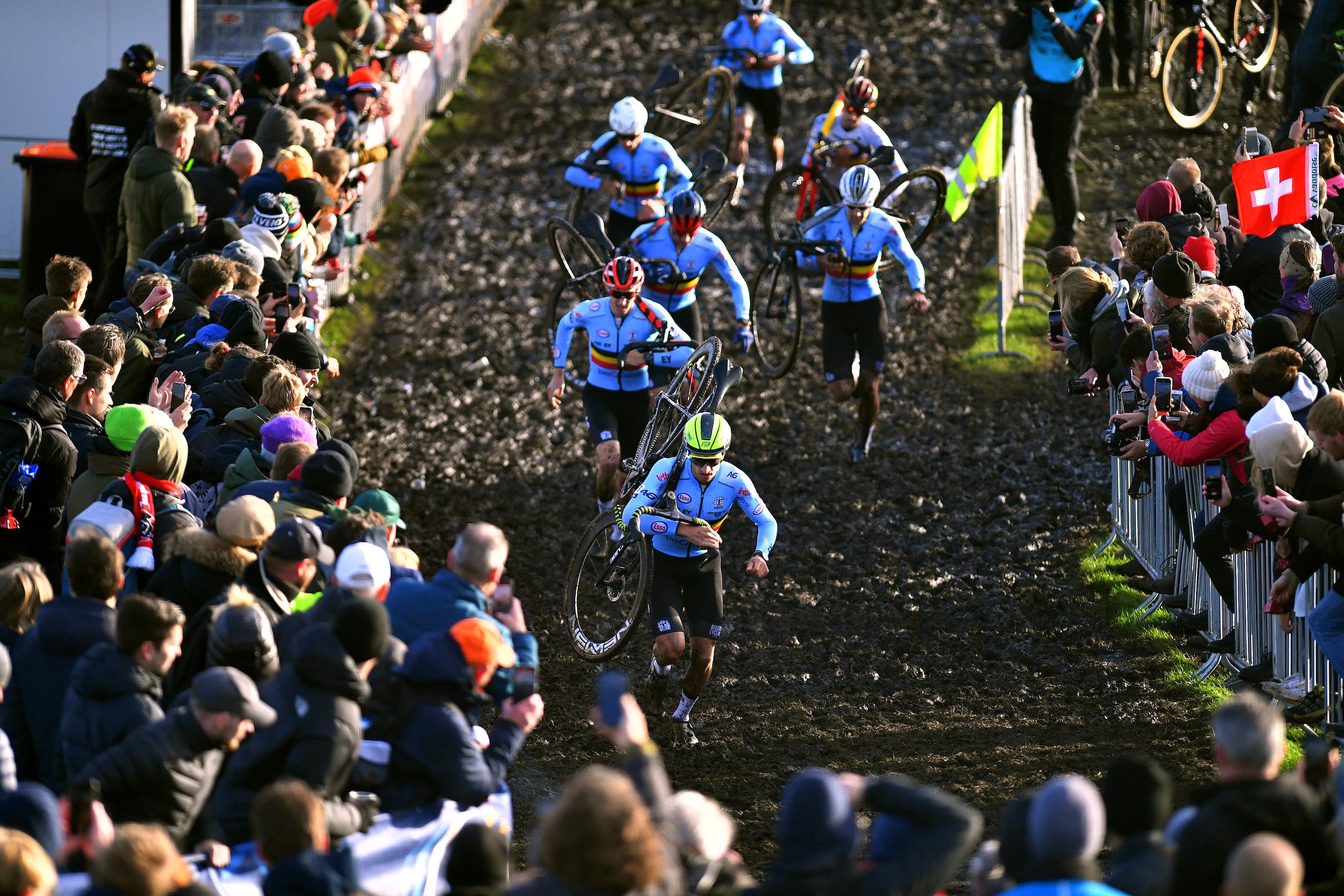 COL DU VAM - DRENTHE, NETHERLANDS - NOVEMBER 07: A general view of Quinten Hermans of Belgium competes while fans cheer during the 19th UEC European Cyclocross Championships 2021 - Men's Elite / #EuroCross21/ @UEC_cycling / on November 07, 2021 in Col du Vam - Drenthe, Netherlands. (Photo by Luc Claessen/Getty Images)