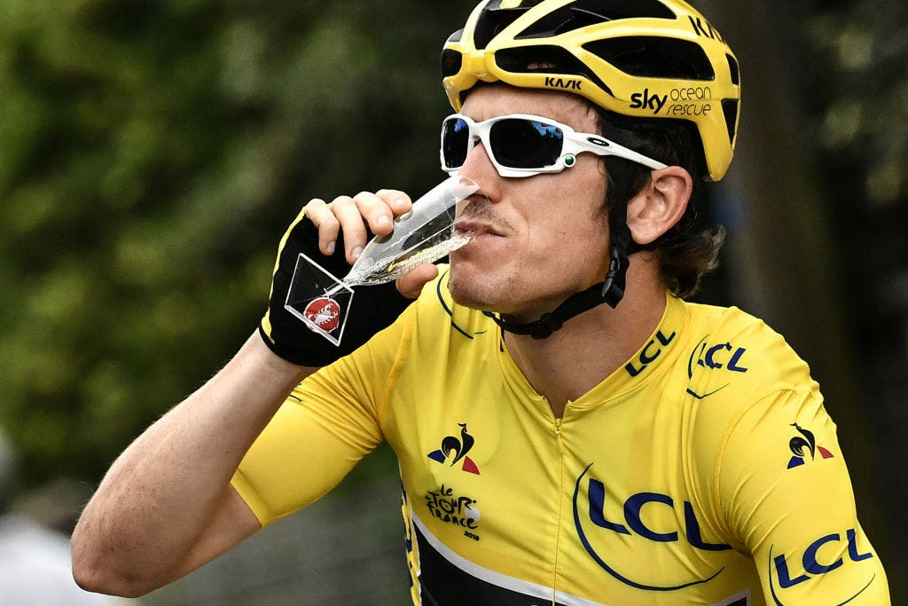 A sip of champagne for Geraint Thomas as he celebrates his 2018 Tour de France win
