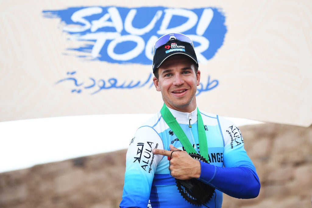 AL-ULA, SAUDI ARABIA - FEBRUARY 03: Dylan Groenewegen of Netherlands and Team BikeExchange - Jayco celebrates winning the astage three on the podium ceremony after the 6th Saudi Tour 2022, Stage 3 a 181,2 km stage from Tayma Hadaj Well to AIUIa Old Town / #SaudiTour / on February 03, 2022 in AIUIa, Saudi Arabia. (Photo by Tim de Waele/Getty Images)