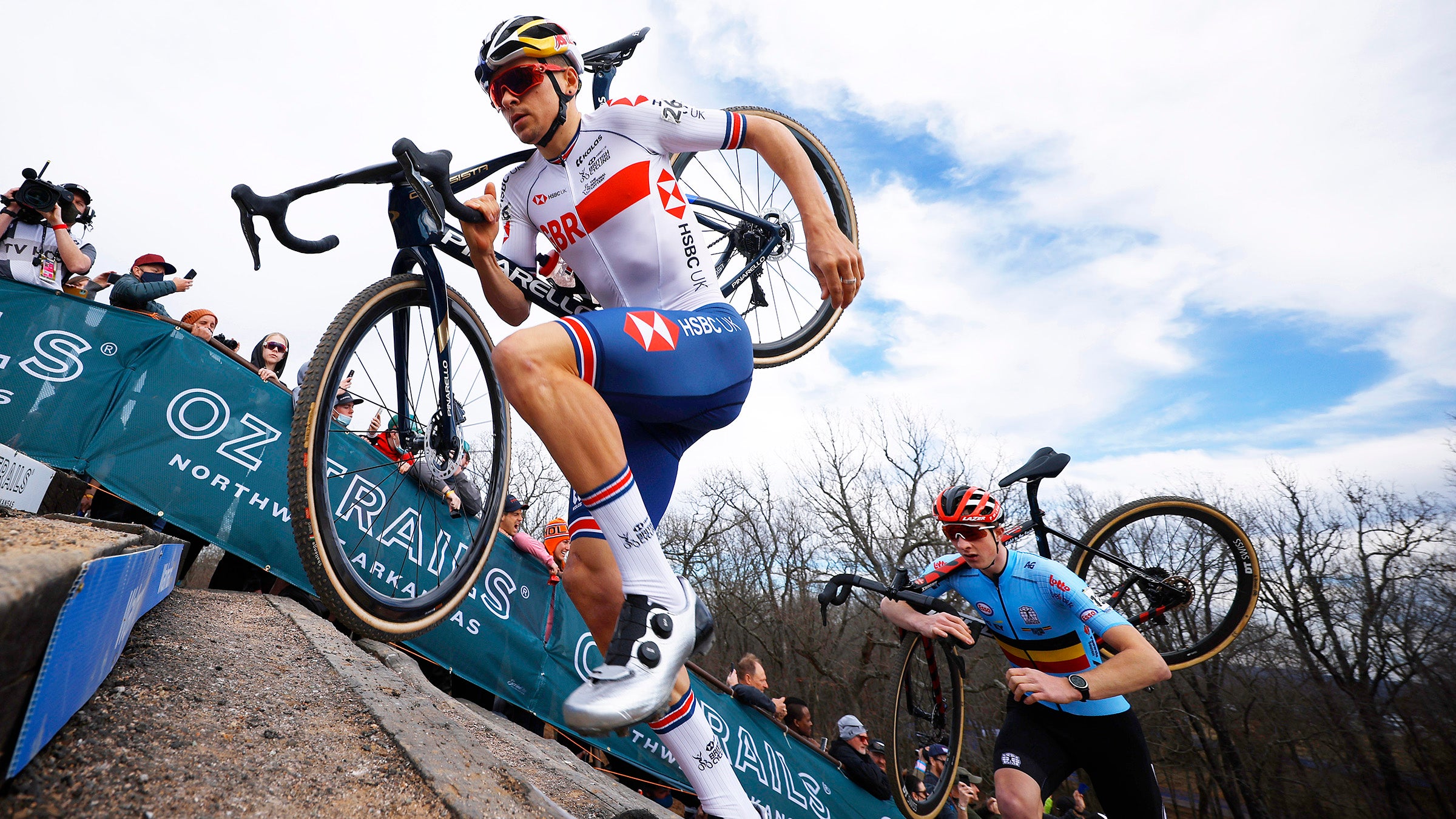 FAYETTEVILLE, ARKANSAS - JANUARY 30: (L-R) Thomas Pidcock of The United Kingdom and Jens Adams of Belgium compete during the 73rd UCI Cyclo-Cross World Championships Fayetteville 2022 - Men's Elite / #Fayetteville2022 / on January 30, 2022 in Fayetteville, Arkansas. (Photo by Chris Graythen/Getty Images)