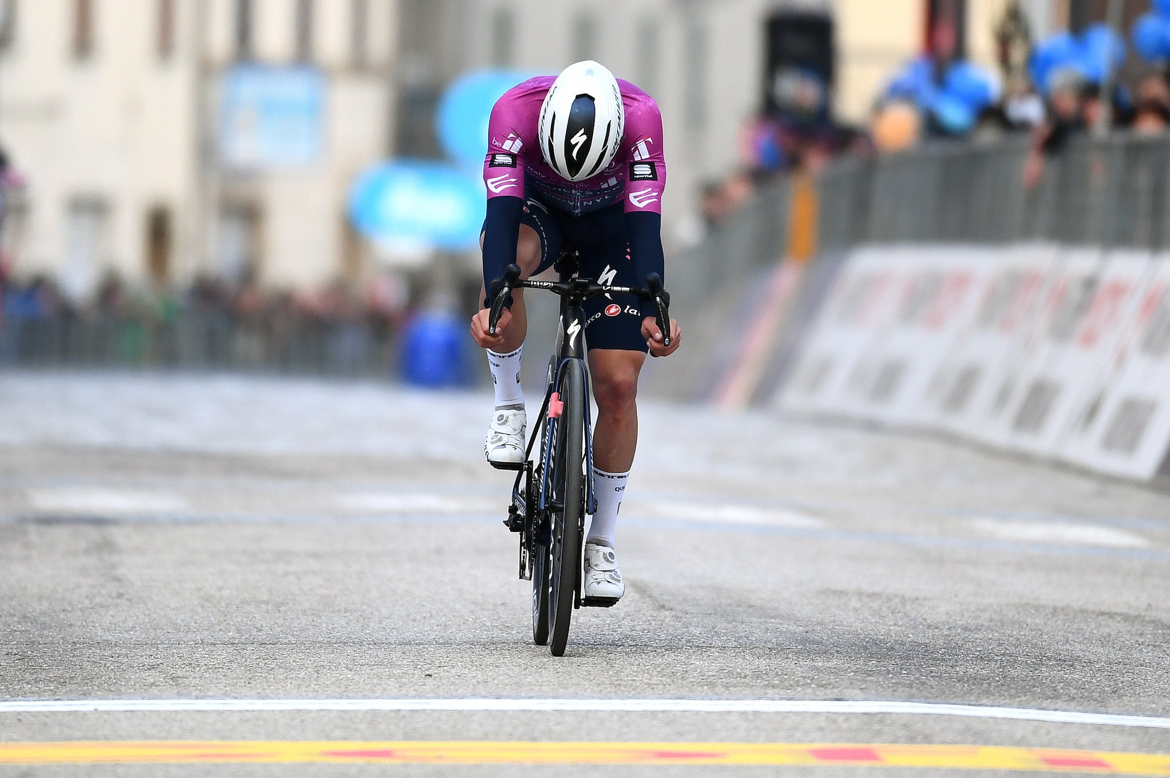 CARPEGNA, ITALY - MARCH 12: Remco Evenepoel of Belgium and Team Quick-Step - Alpha Vinyl Purple Sprint Jersey crosses the finish line during the 57th Tirreno-Adriatico 2022, Stage 6 a 215km stage from Apecchio to Carpegna 746m / #TirrenoAdriatico / #WorldTour / on March 12, 2022 in Carpegna, Italy. (Photo by Tim de Waele/Getty Images)