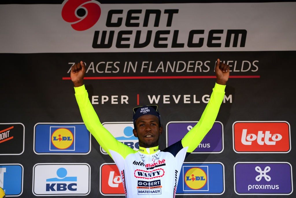 WEVELGEM, BELGIUM - MARCH 27: Biniam Hailu Girmay of Eritrea and Team Intermarché - Wanty - Gobert Matériaux celebrates winning the race on the podium ceremony after the 84th Gent-Wevelgem in Flanders Fields 2022 - Men's Elite a 248,8km one day race from Ypres to Wevelgem / #GWE22 / #WorldTour / on March 27, 2022 in Wevelgem, Belgium. (Photo by Tim de Waele/Getty Images)
