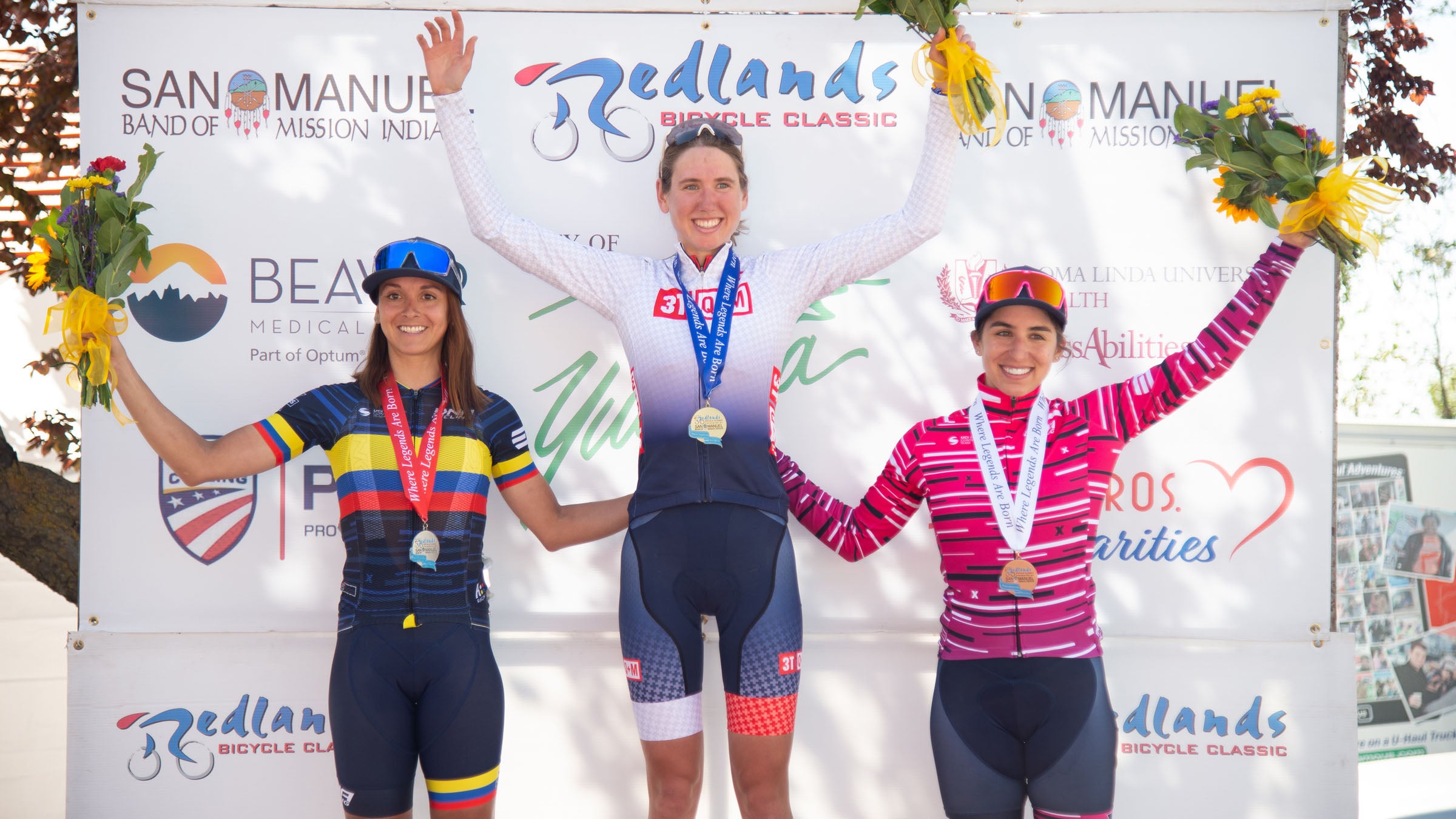 Women’s podium with Emily Marcolini on the top step, Diana Penuala of DNA Cycling in second, and teammate Erica Clevenger in third.