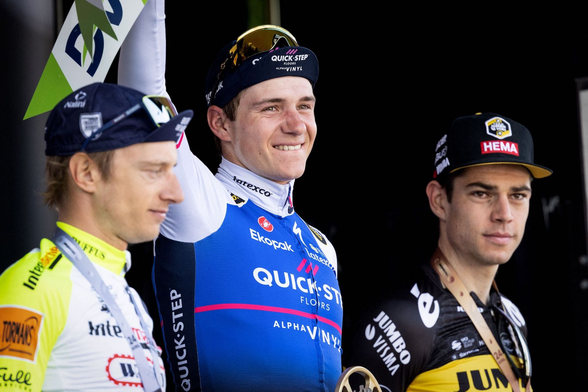 Remco Evenepoel, shown here on the Liège podium, won in his return to competition.