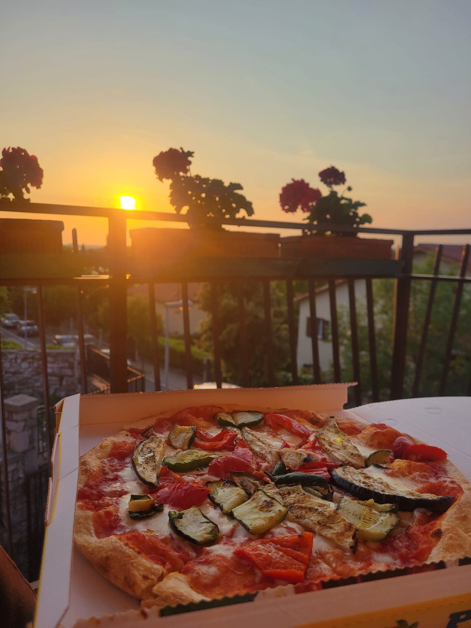 Enjoying a pizza after a long day of riding