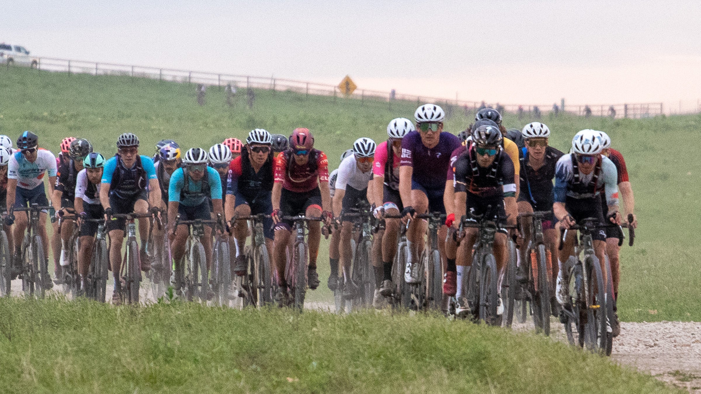 A large lead group came through the cattle pens section fo the Unbound Gravel course at maile 28. Photo: Brad Kaminski