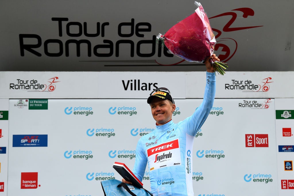 VILLARS-SUR-OLLON, SWITZERLAND - MAY 01: Toms Skujins of Latvia and Team Trek - Segafredo Blue Mountain Jersey celebrates at podium during the 75th Tour De Romandie 2022 - Stage 5 a 15,84km Individual Time Trial stage from Aigle to Villars-sur-Ollon 1256m / ITT / #TDR2022 / on May 01, 2022 in Villars-sur-Ollon, Switzerland. (Photo by Dario Belingheri/Getty Images)