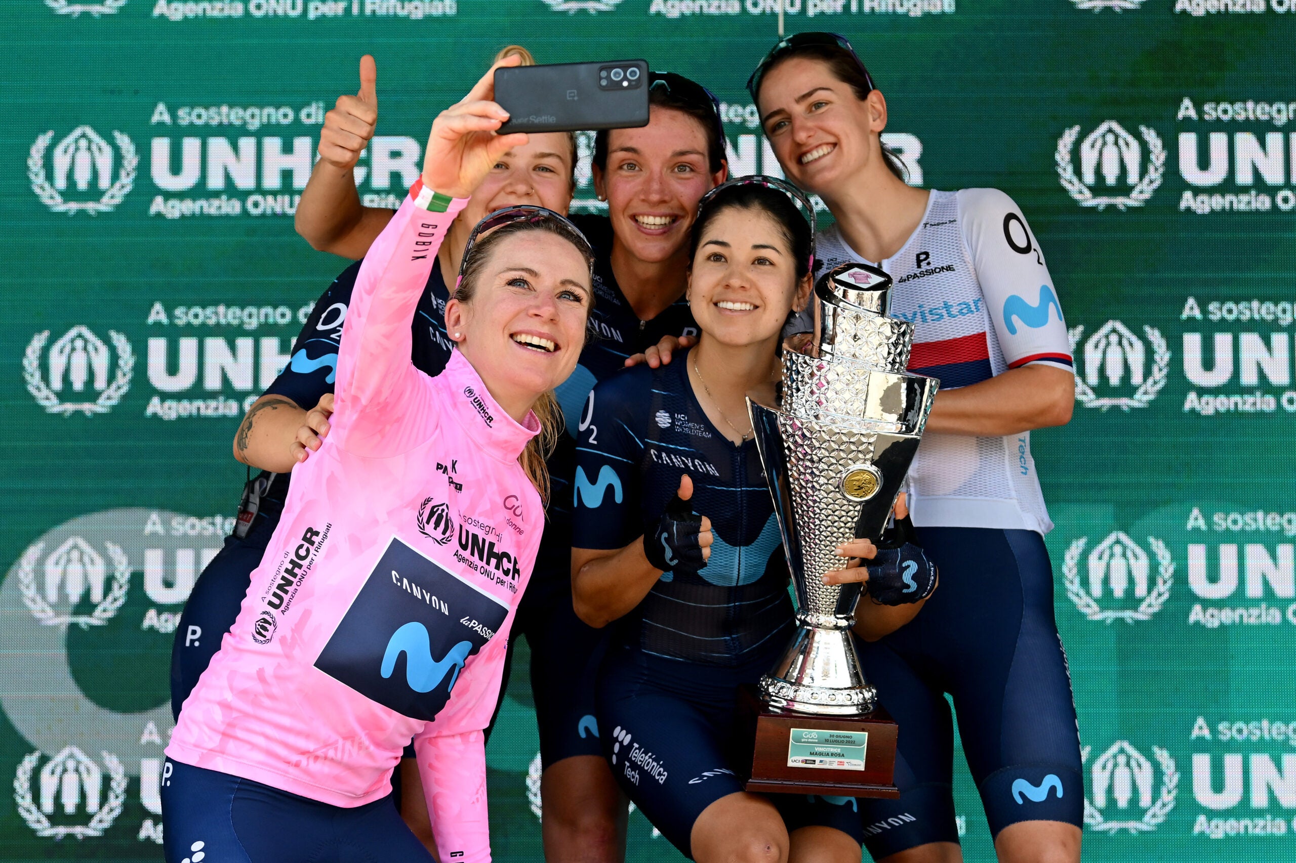 PADOVA, ITALY - JULY 10: (L-R) Jelena Eric of Serbia, Aude Biannic of France, Annemiek Van Vleuten of Netherlands pink leader jersey, Paula Andrea Patiño Bedoya of Colombia and Emma Norsgaard Jorgensen of Denmark and Movistar Team pose for a photograph on the podium ceremony after the 33rd Giro d'Italia Donne 2022 - Stage 10 a 90,5km stage from Abano Terme to Padova / #GiroDonne / #UCIWWT / on July 10, 2022 in Padova, Italy. (Photo by Dario Belingheri/Getty Images,)