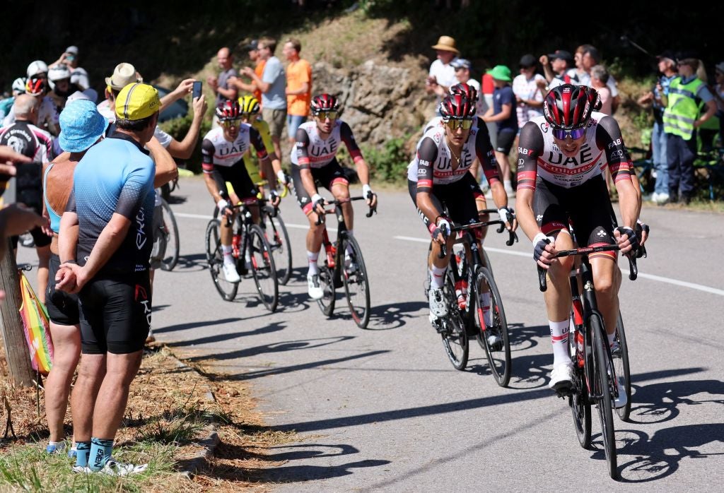 UAE Team Emirates team's Norwegian rider Vegard Stake Laengen (R) cycles ahead of his teammates leading the pack of riders during the 7th stage of the 109th edition of the Tour de France cycling race, 176,3 km between Tomblaine and La Super Planche des Belles Filles, in eastern France, on July 8, 2022. (Photo by Thomas SAMSON / AFP) (Photo by THOMAS SAMSON/AFP via Getty Images)