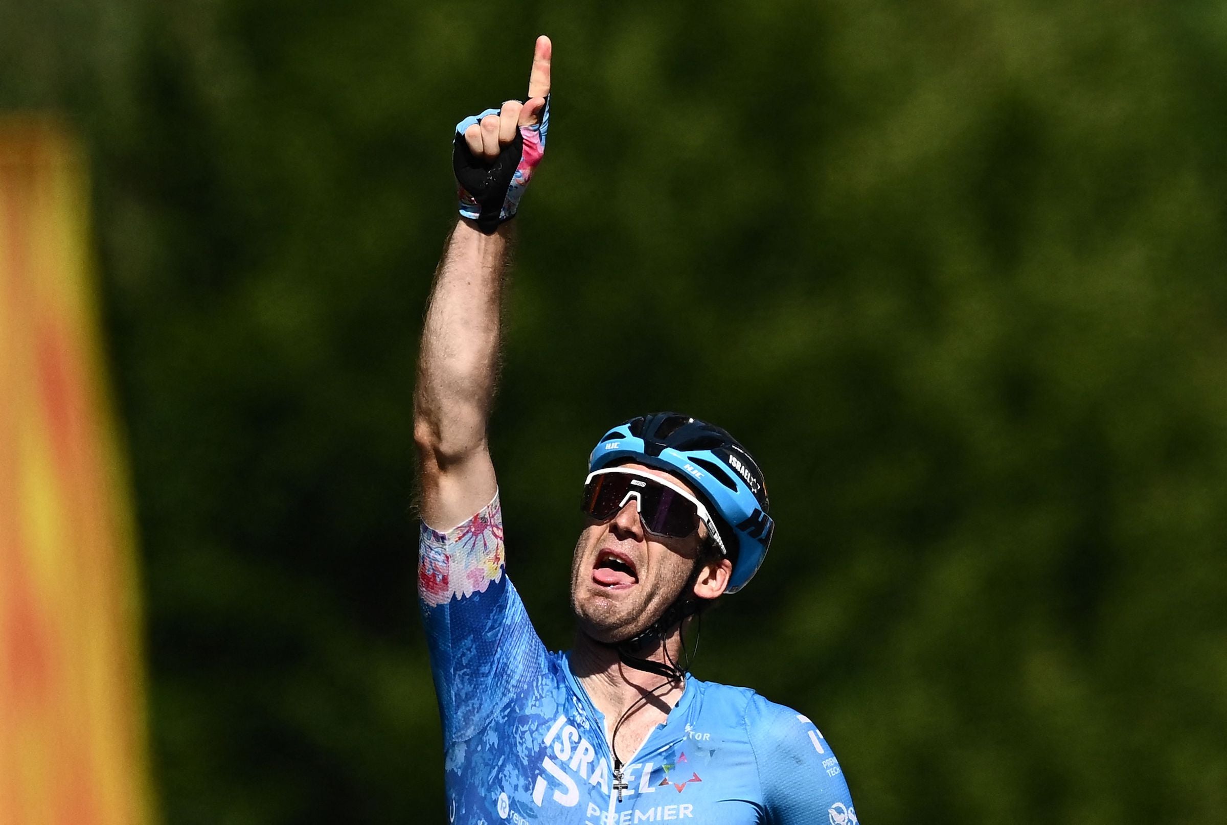 Hugo Houle celebrates victory at the Tour de France.