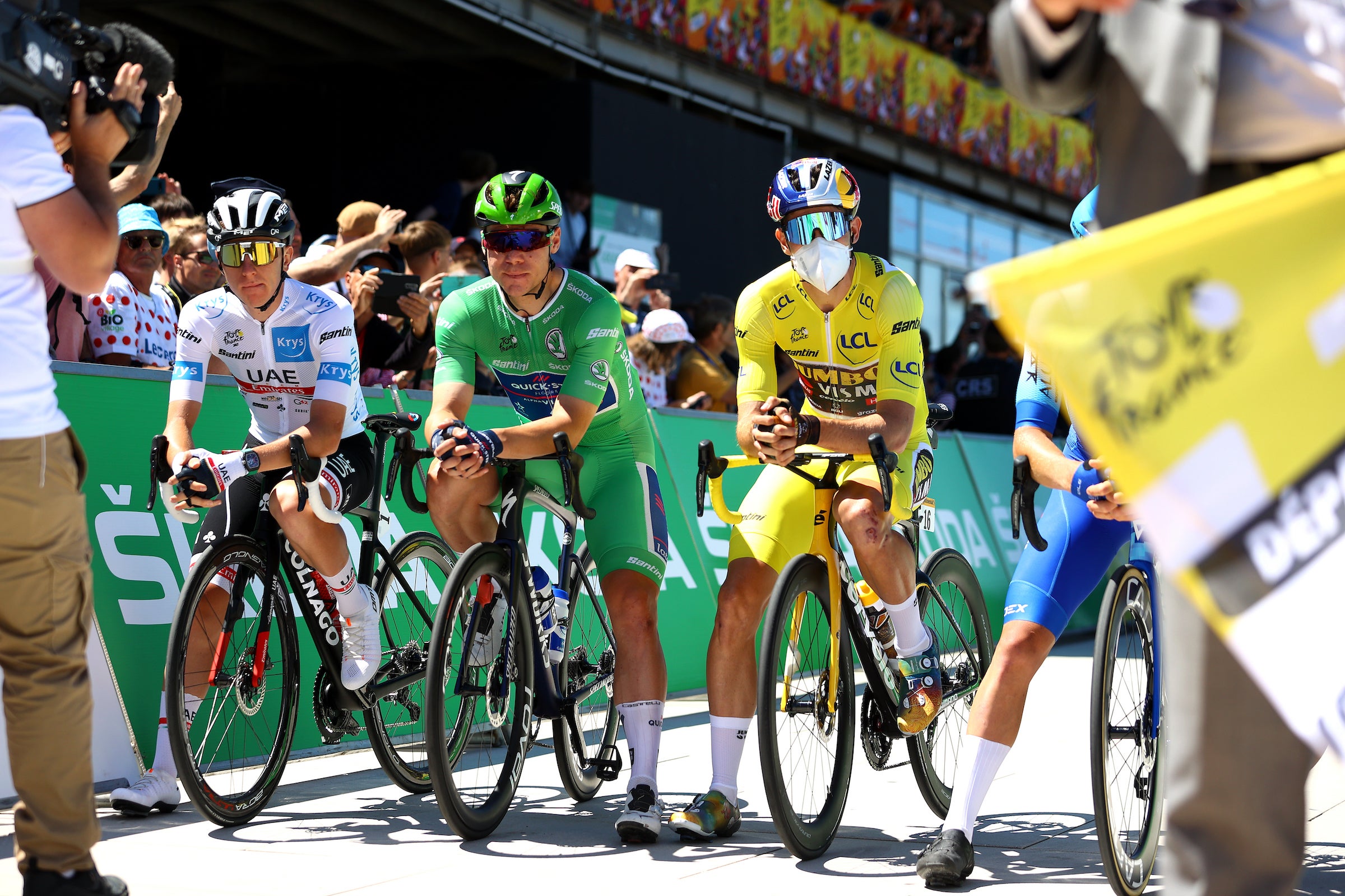 Fabio Jakobsen (QuickStep-Alpha Vinyl) with Tadej Pogačar (UAE Team Emirates, L) and  Wout Van Aert (Team Jumbo - Visma) prior to the start of stage 4 of the 2022 Tour de France. 