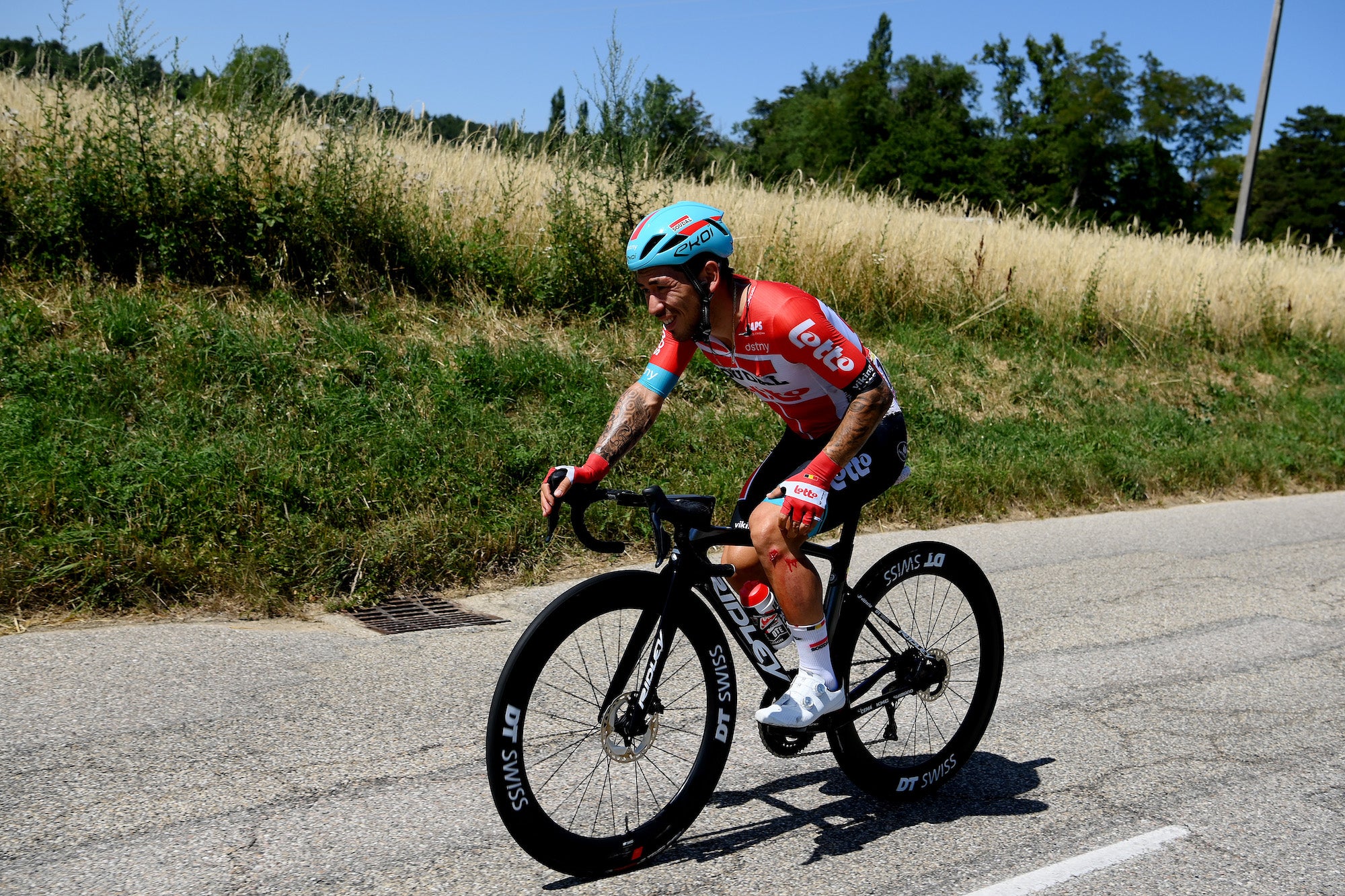 Caleb Ewan chases back from a crash Friday at the Tour de France.