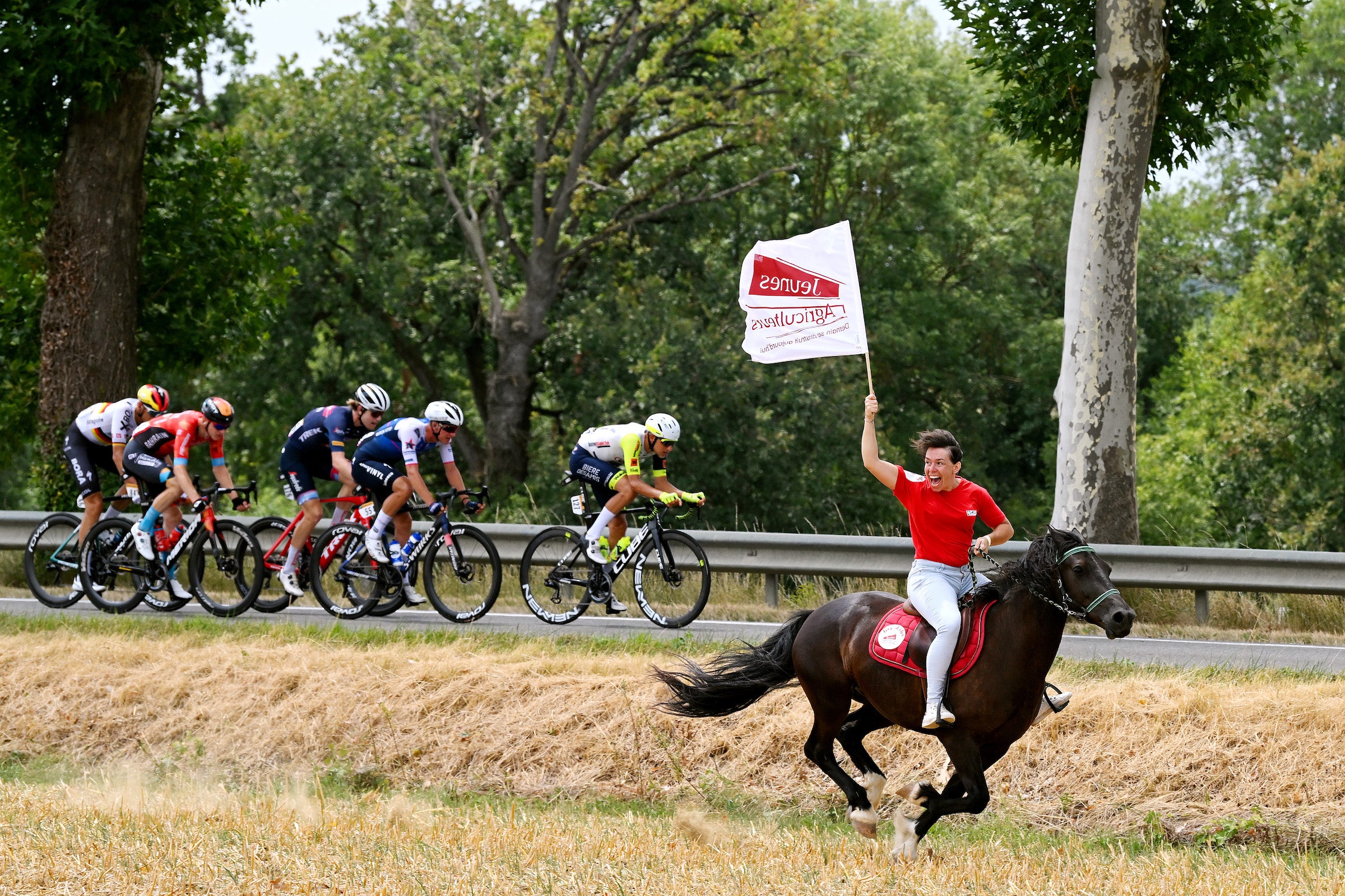 CAHORS, FRANCE - JULY 22: A fan on horseback cheering the breakaway during the 109th Tour de France 2022, Stage 19 a 188,3km stage from Castelnau-Magnoac to Cahors / #TDF2022 / #WorldTour / on July 22, 2022 in Cahors, France. (Photo by Dario Belingheri/Getty Images)