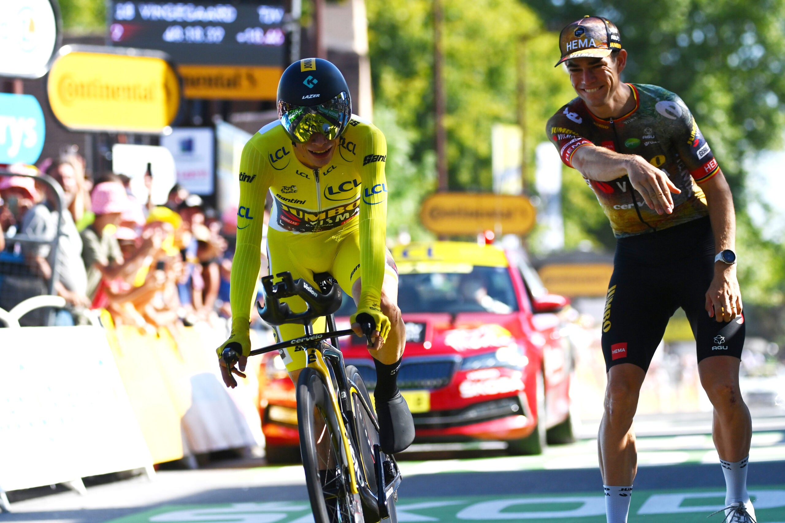 ROCAMADOUR, FRANCE - JULY 23: Jonas Vingegaard Rasmussen of Denmark and Team Jumbo - Visma - Yellow Leader Jersey crosses the finish line and celebrates as final overall winner with his teammate Wout Van Aert of Belgium and Team Jumbo - Visma during the 109th Tour de France 2022, Stage 20 a 40,7km individual time trial from Lacapelle-Marival to Rocamadour / #TDF2022 / #WorldTour / on July 23, 2022 in Rocamadour, France. (Photo by Tim de Waele/Getty Images)