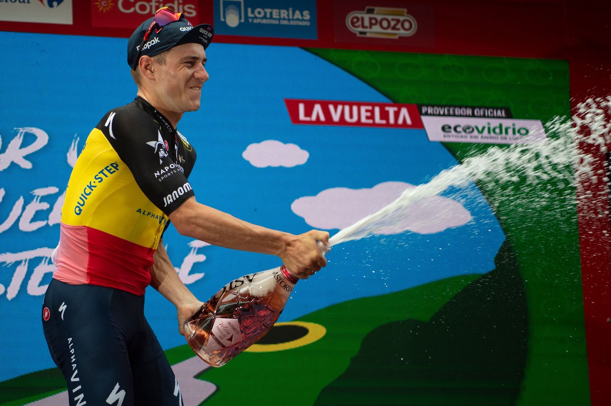 Evenepoel celebrates his first career grand tour stage victory.