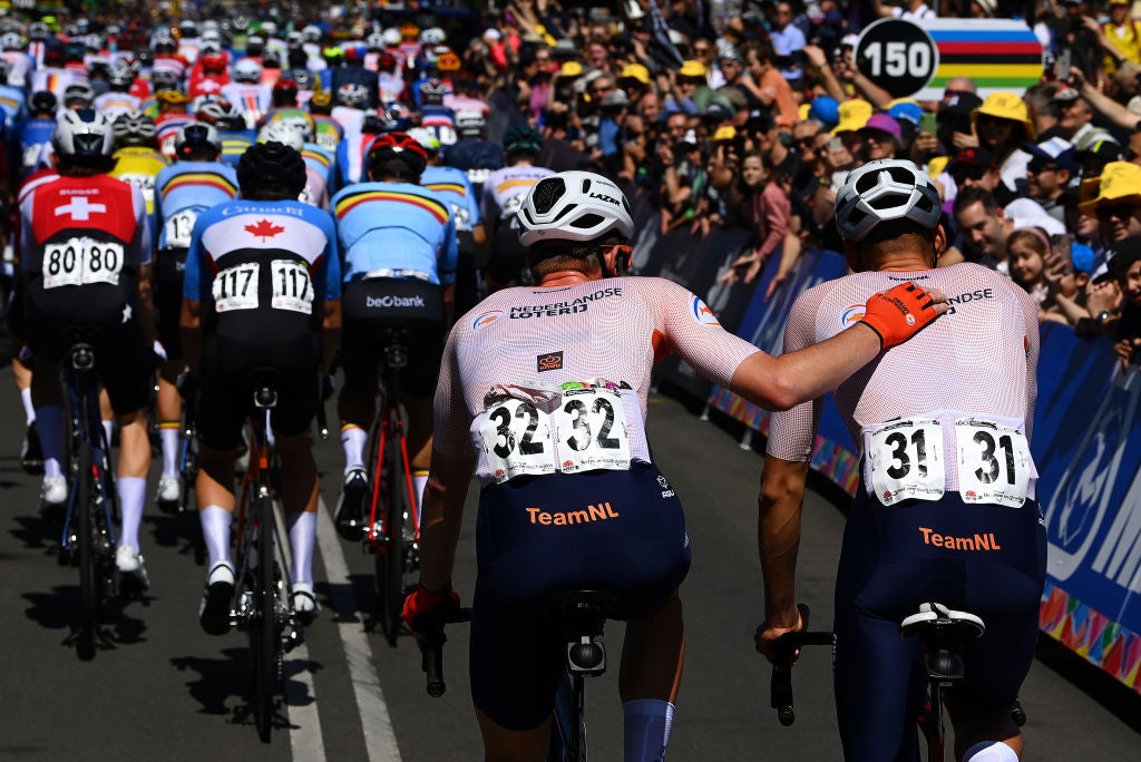 WOLLONGONG, AUSTRALIA - SEPTEMBER 25: (L-R) Pascal Eenkhoorn of The Netherlands and Mathieu Van Der Poel of The Netherlands (abandoning the race) during the 95th UCI Road World Championships 2022, Men Elite Road Race a 266,9km race from Helensburgh to Wollongong / #Wollongong2022 / on September 25, 2022 in Wollongong, Australia. (Photo by Tim de Waele/Getty Images)
