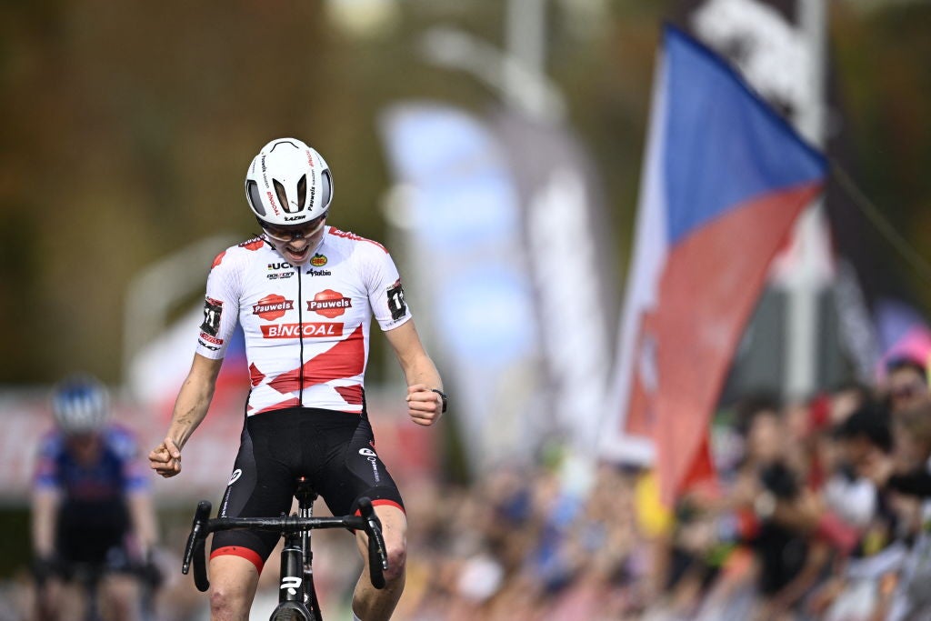 Dutch Fem Van Empel celebrates after winning the women elite race at the World Cup cyclocross cycling event in Tabor, Czech Republic, stage 3 (out of 16) of the UCI World Cup cyclocross competition, Sunday 23 October 2022.
BELGA PHOTO JASPER JACOBS (Photo by JASPER JACOBS / BELGA MAG / Belga via AFP) (Photo by JASPER JACOBS/BELGA MAG/AFP via Getty Images)