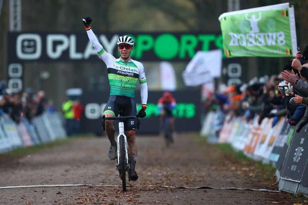 Belgian Laurens Sweeck celebrates as he crosses the finish line to win the men's race of the Superprestige Merksplas, third stage of the Superprestige cyclocross cycling competition, Saturday 19 November 2022, in Merksplas.
BELGA PHOTO DAVID PINTENS (Photo by DAVID PINTENS / BELGA MAG / Belga via AFP) (Photo by DAVID PINTENS/BELGA MAG/AFP via Getty Images)