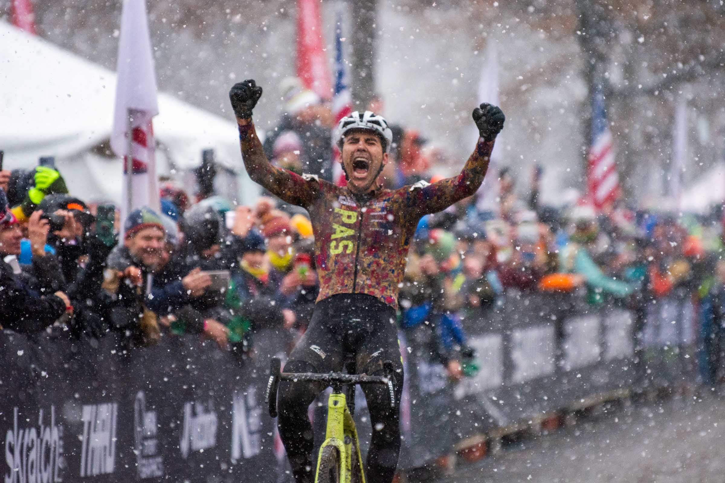 Curtis White celebrates winning the 2022 cyclocross national championship men's elite race in Hartford, Connecticut.