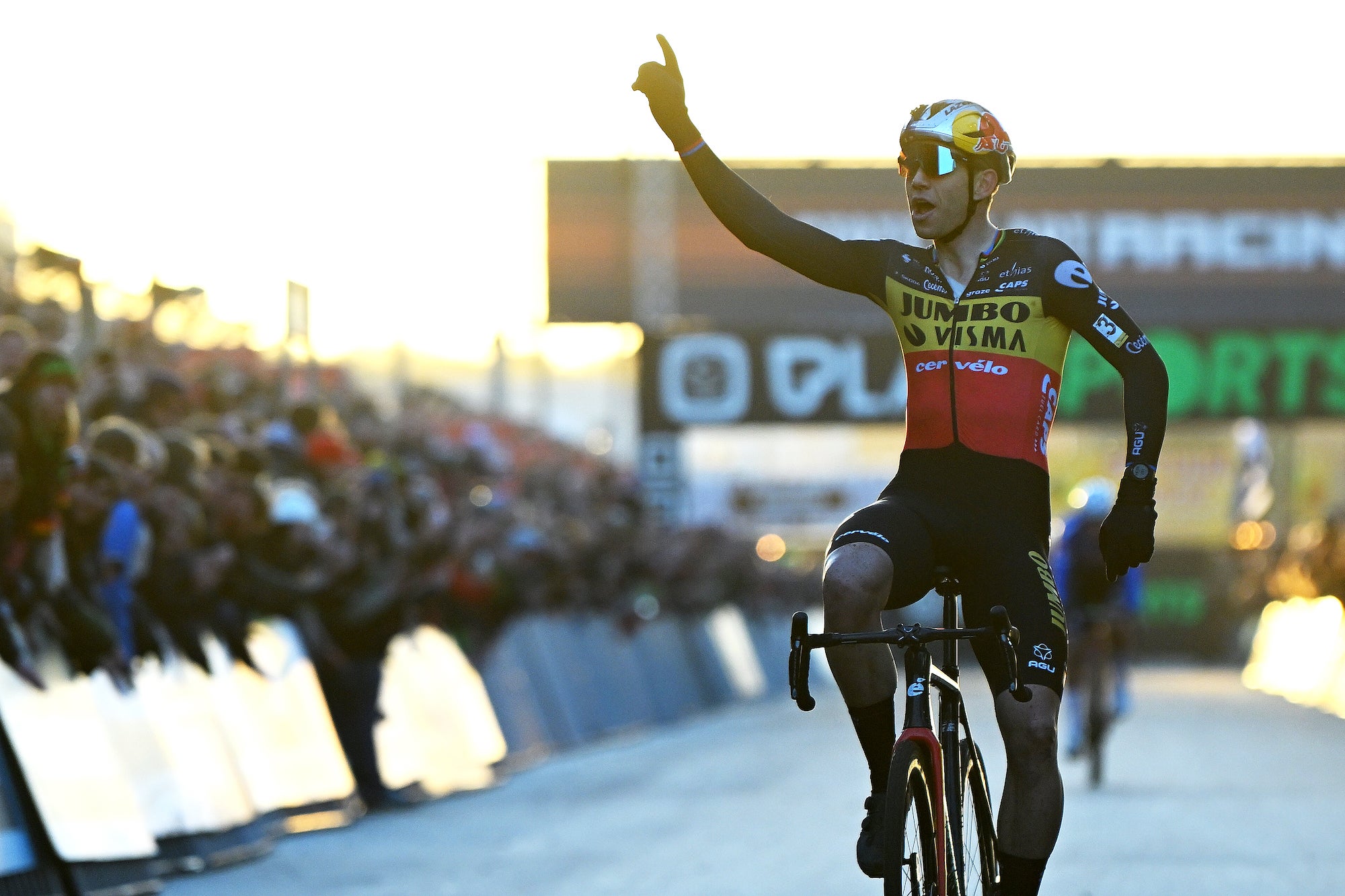 Van Aert celebrates victory in an intense race at Zolder on Tuesday.