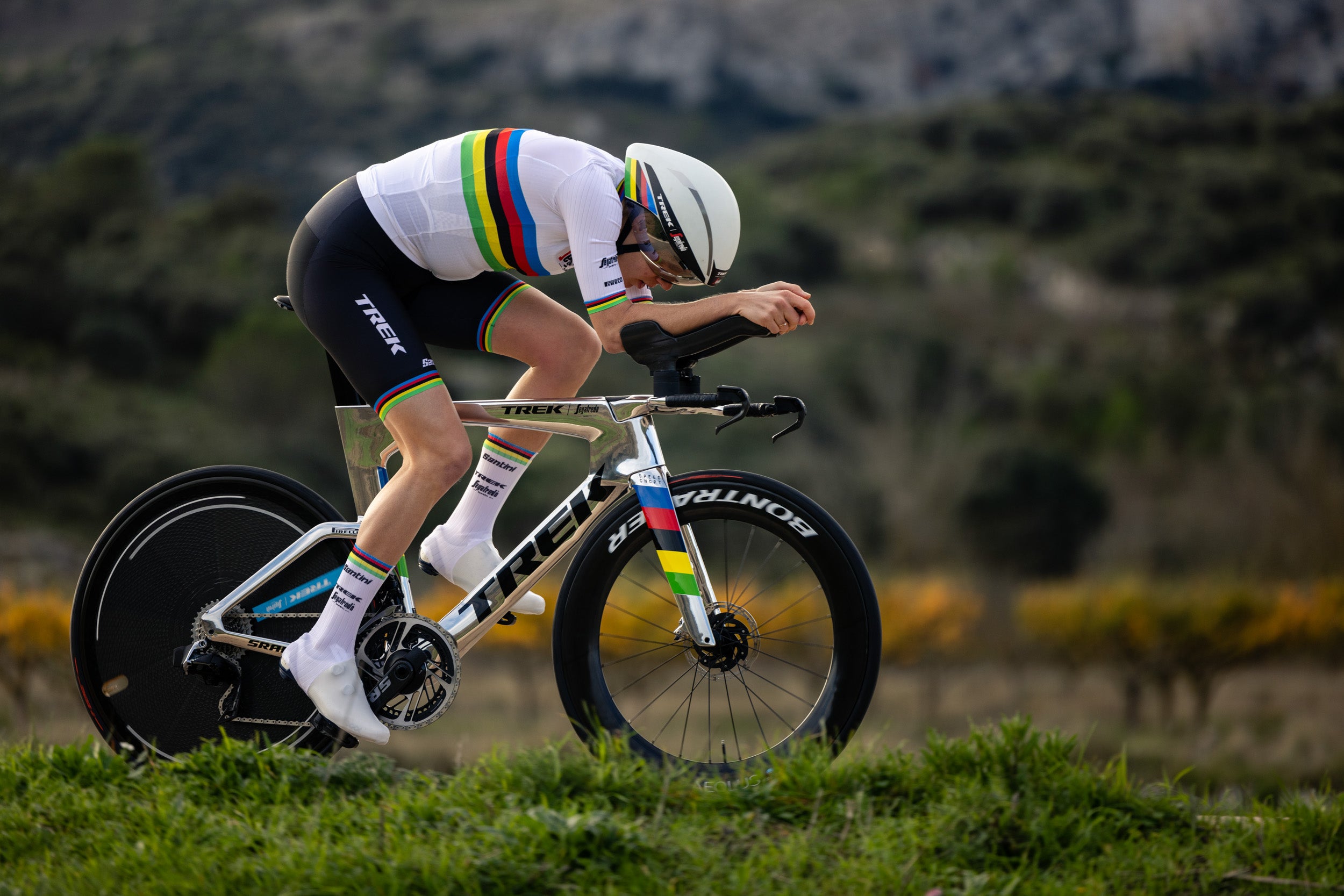 Ellen van Dijk rides her blinged out TT bike with her rainbow jersey