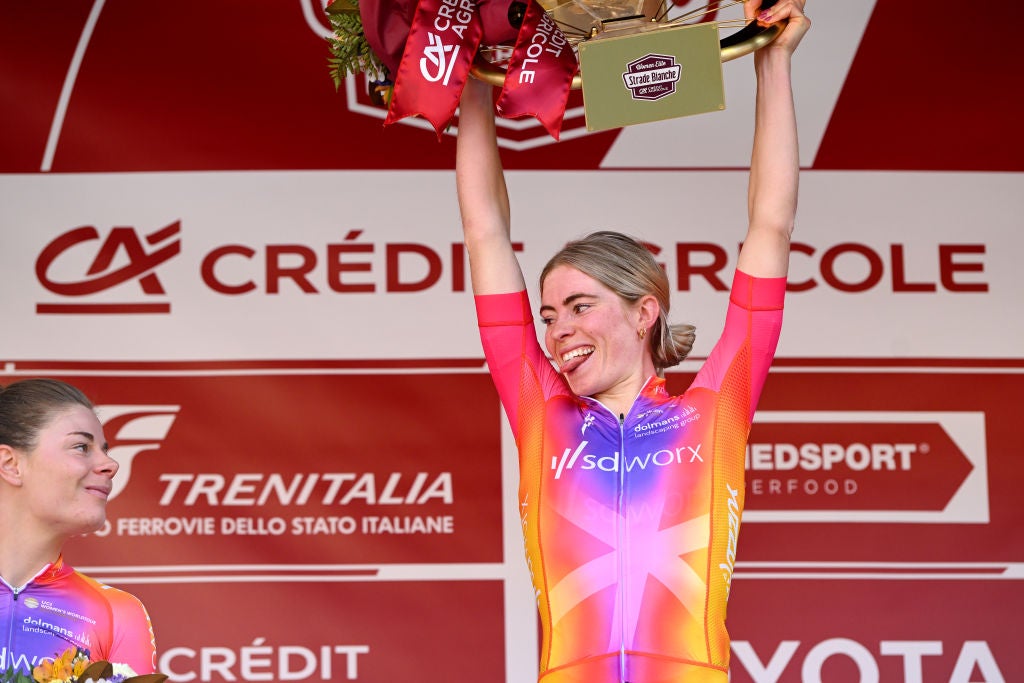 SIENA, ITALY - MARCH 04: (L-R) Lotte Kopecky of Belgium and Team SD Worx on second place and race winner Demi Vollering of The Netherlands and Team SD Worx pose on the podium ceremony after the Eroica - 9th Strade Bianche 2023, Women's a 136km one day race from Siena to Siena 318m / #StradeBianche / on March 04, 2023 in Siena, Italy. (Photo by Luc Claessen/Getty Images)