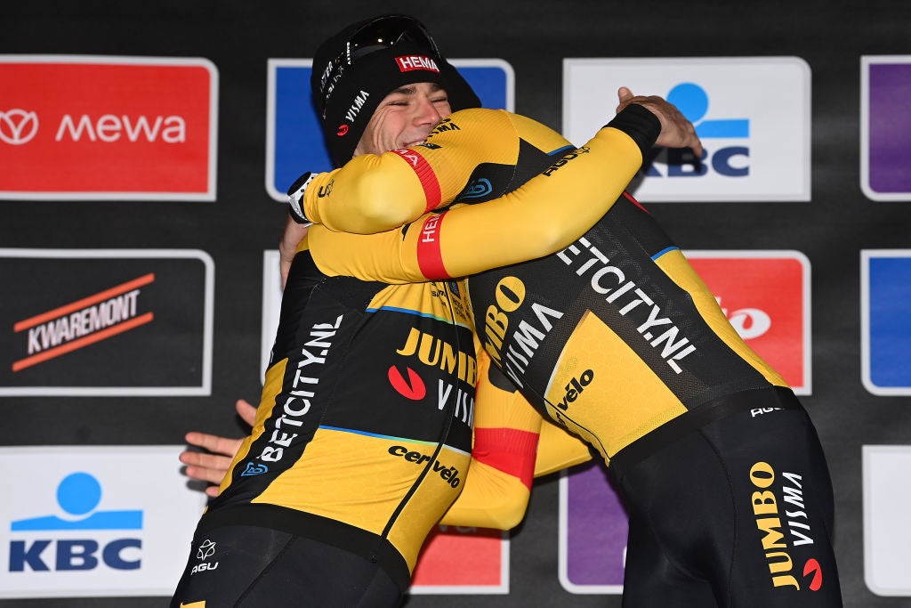WEVELGEM, BELGIUM - MARCH 26: (L-R) The second classified Wout Van Aert of Belgium and race winner Christophe Laporte of France and Team Jumbo-Visma congratulate each other at podium during the 85th Gent-Wevelgem in Flanders Fields 2023, Men's Elite a 260.9km one day race from Ypres to Wevelgem / #UCIWT / on March 26, 2023 in Wevelgem, Belgium. (Photo by Tim de Waele/Getty Images)